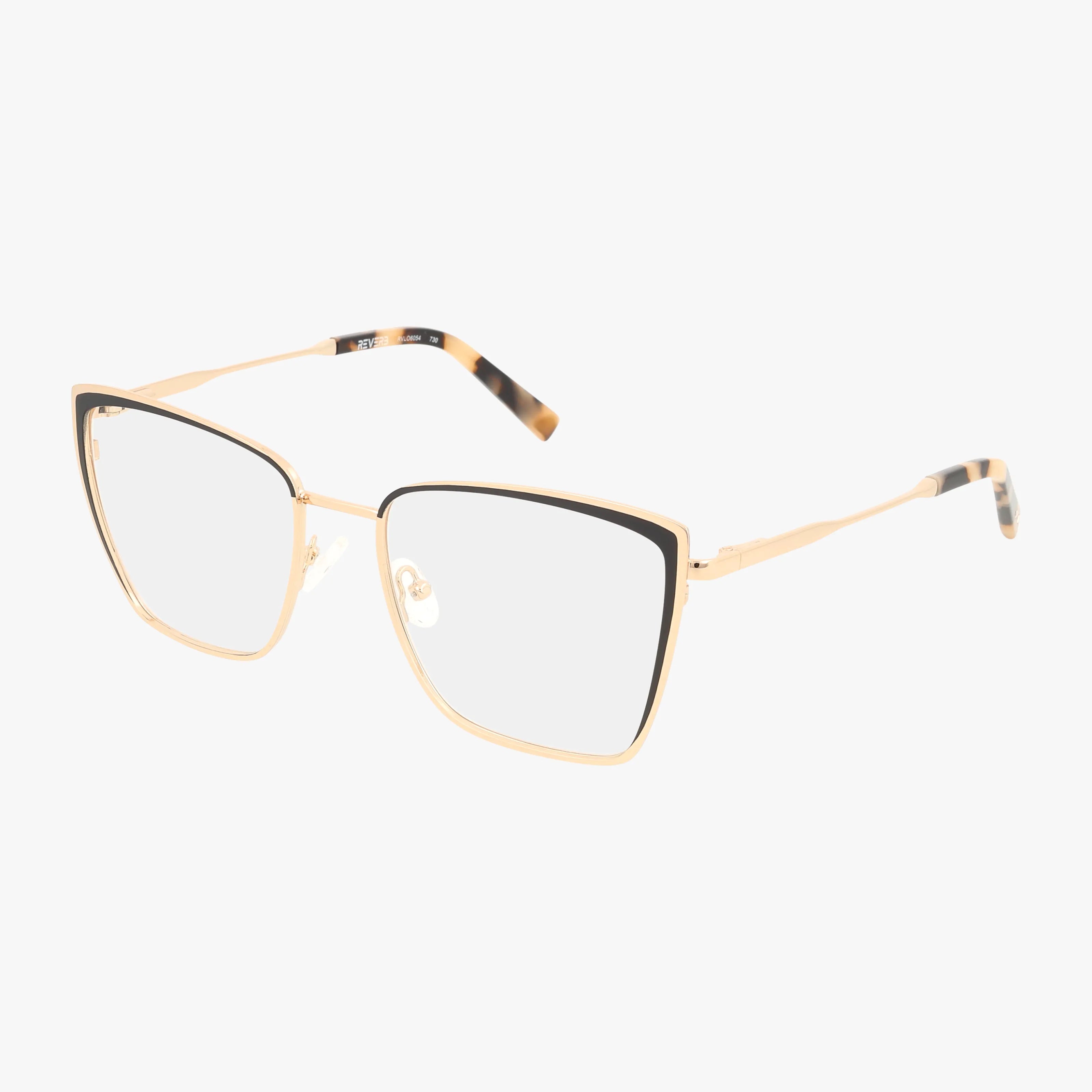 RVLO6054 is a bold pair of gold metal cat-eye eyeglasses featuring black accents on the upper rims and tortoiseshell-patterned arm tips, displayed on a white background.