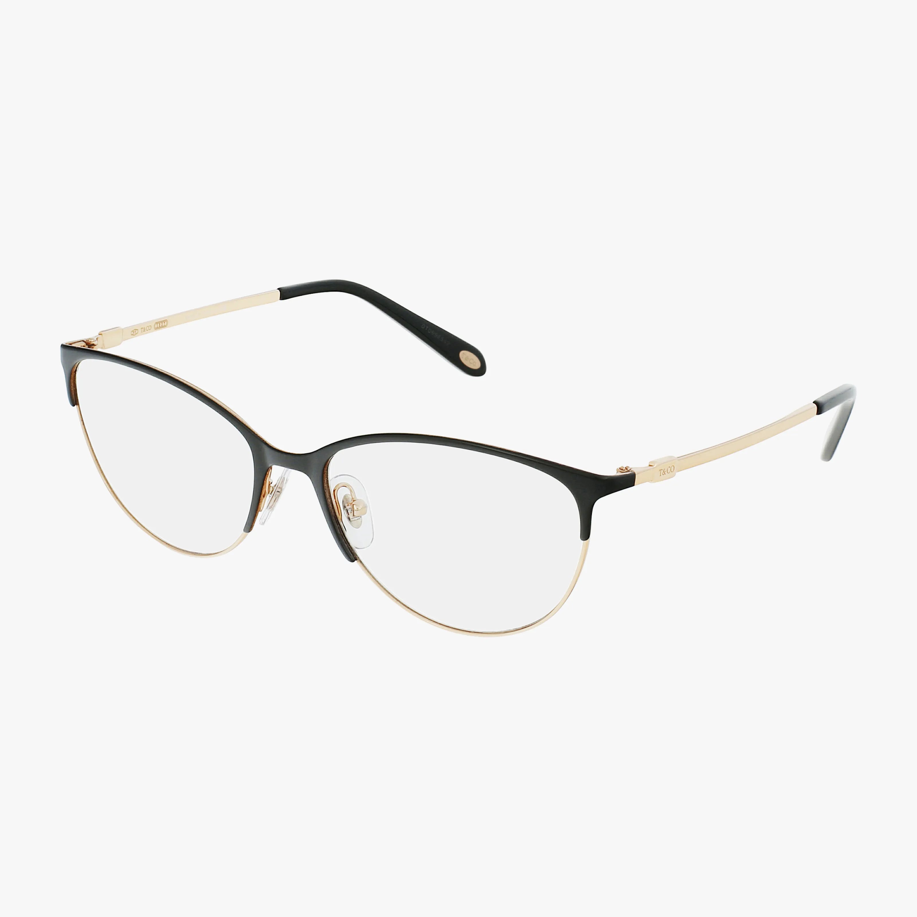 The TF1127 eyeglasses feature black upper rims, gold lower rims, and gold temples in a chic, lightweight frame with transparent nose pads for modern style and comfort.