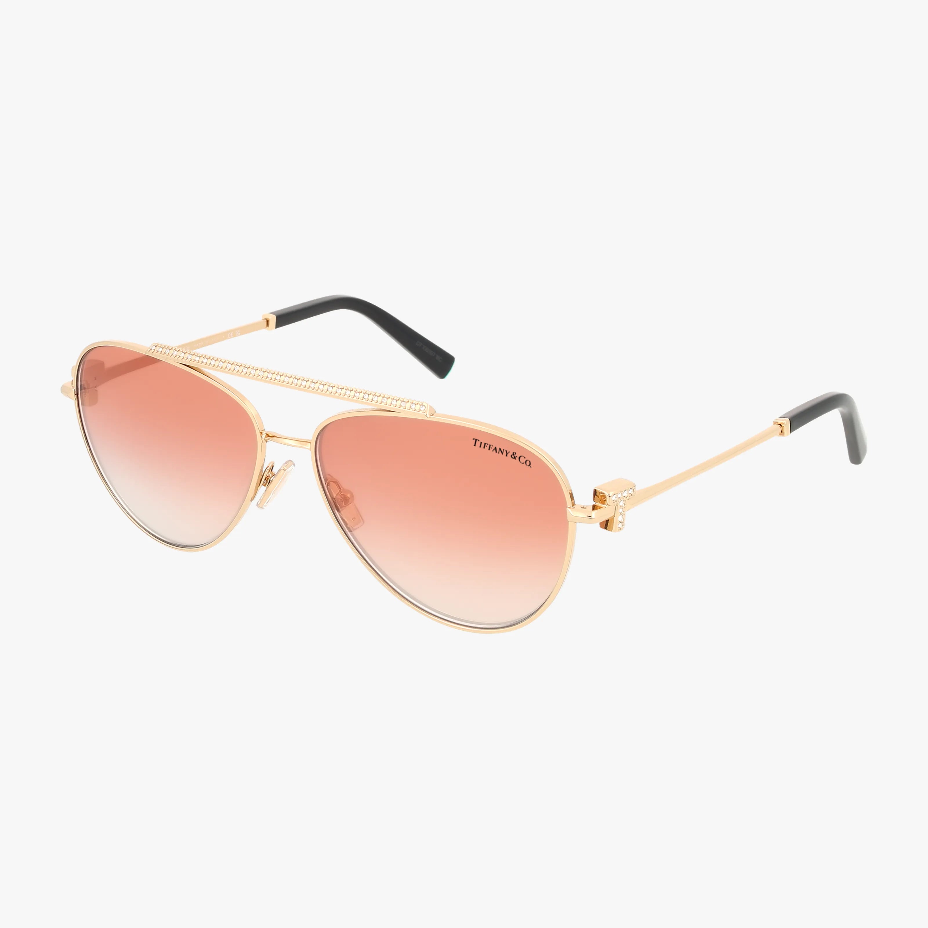 The TF3101B sunglasses feature a gold aviator frame, pink gradient lenses, and black earpieces, showcased on a white background.