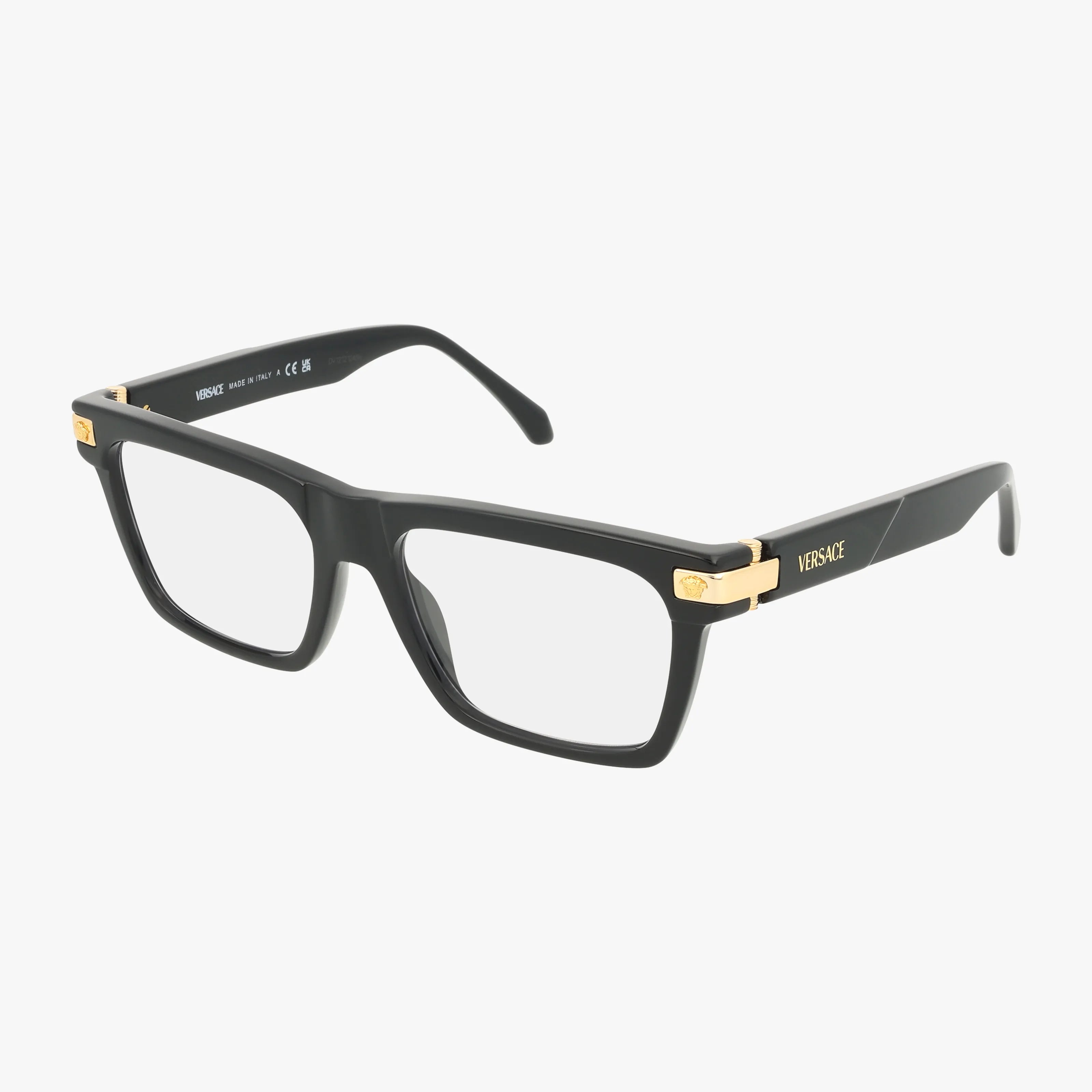 Versace VE3354 eyeglasses feature a bold black rectangular frame with gold accents on the temples and hinges. The Versace logo is displayed on the side, and the sturdy build stands out against a plain white background.