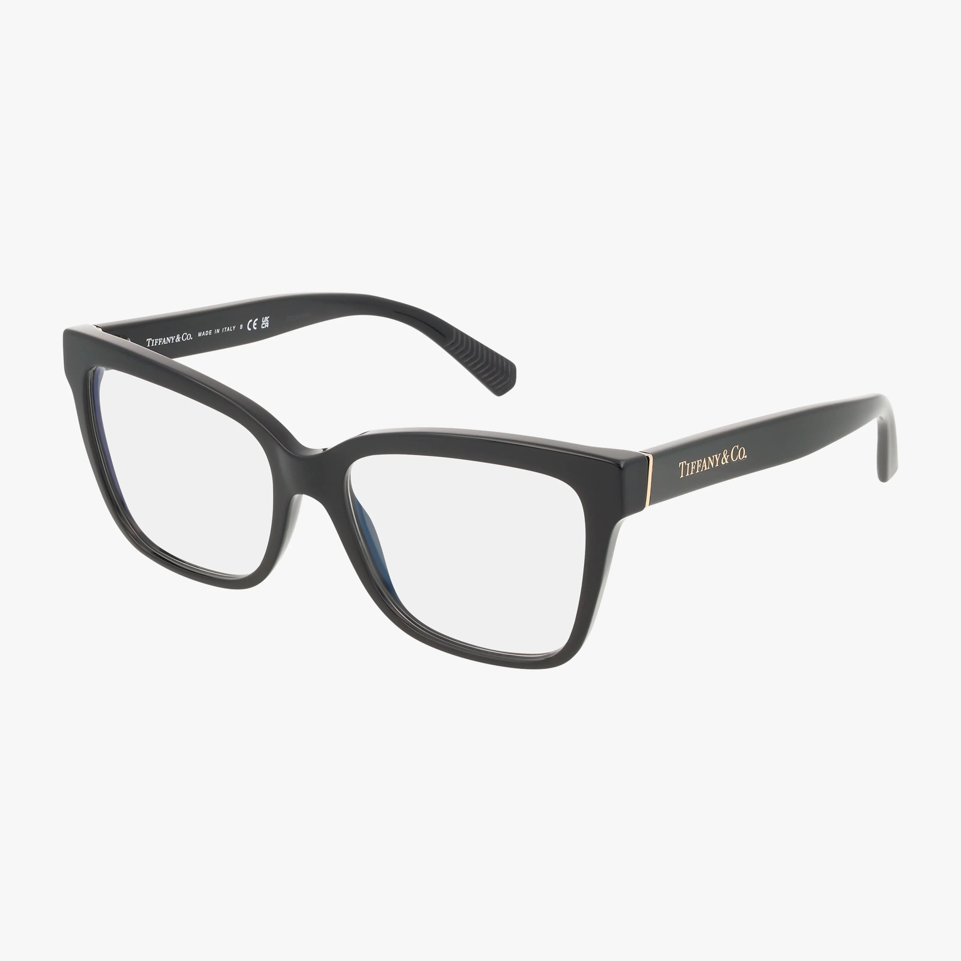 TF2260 eyeglasses feature black rectangular thick frames with clear lenses for a polished look. The Tiffany & Co. name is printed in gold on the arms, and the glasses are displayed against a plain white background.