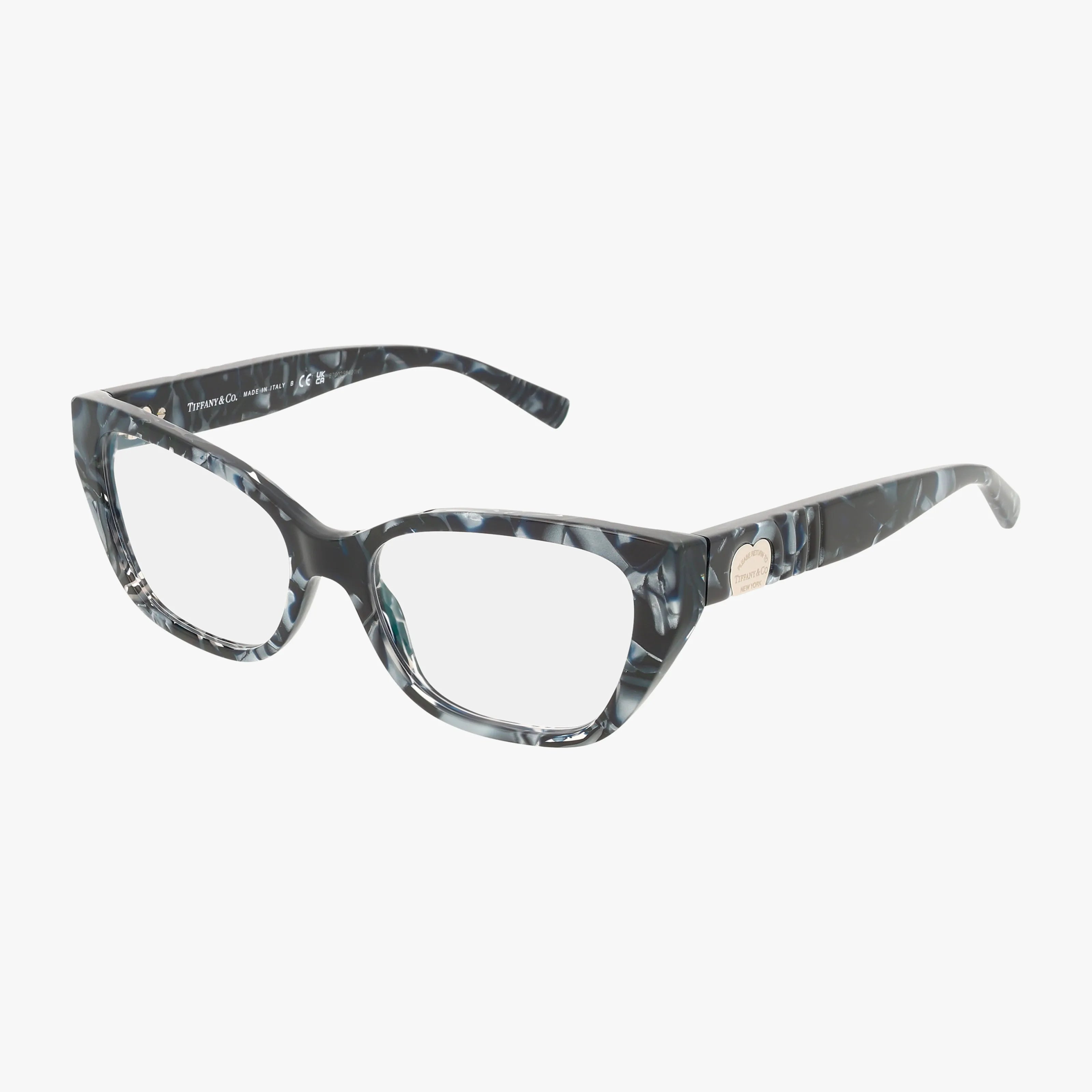The TF2259 cat-eye eyeglasses feature a marbled black, gray, and white tailored frame with clear lenses and a gold accent on the temples, displayed on a white background.