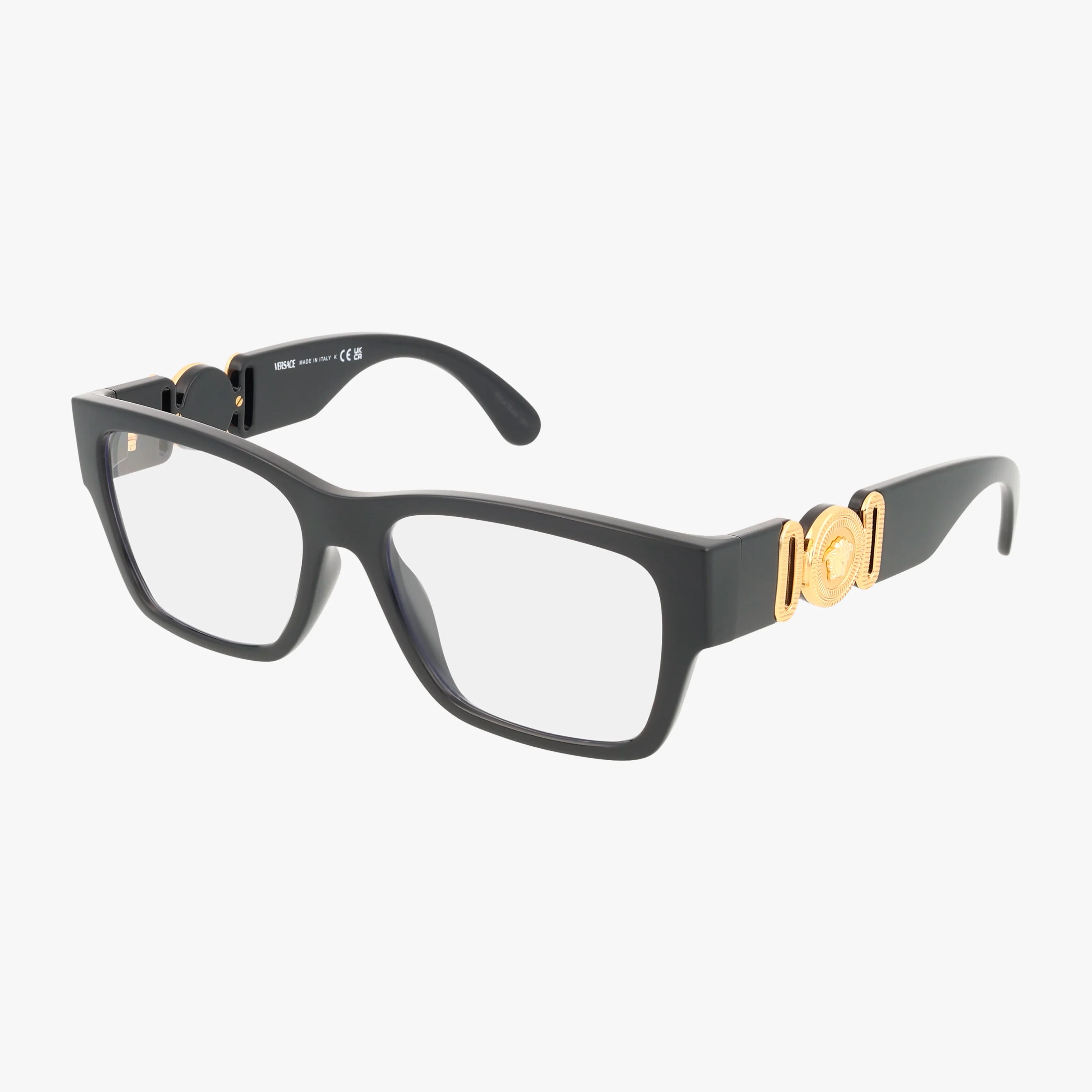 The VE3368U eyeglasses feature a black rectangular frame with clear lenses and a gold decorative emblem on the temples near the hinges, combining distinctive style with functional design.