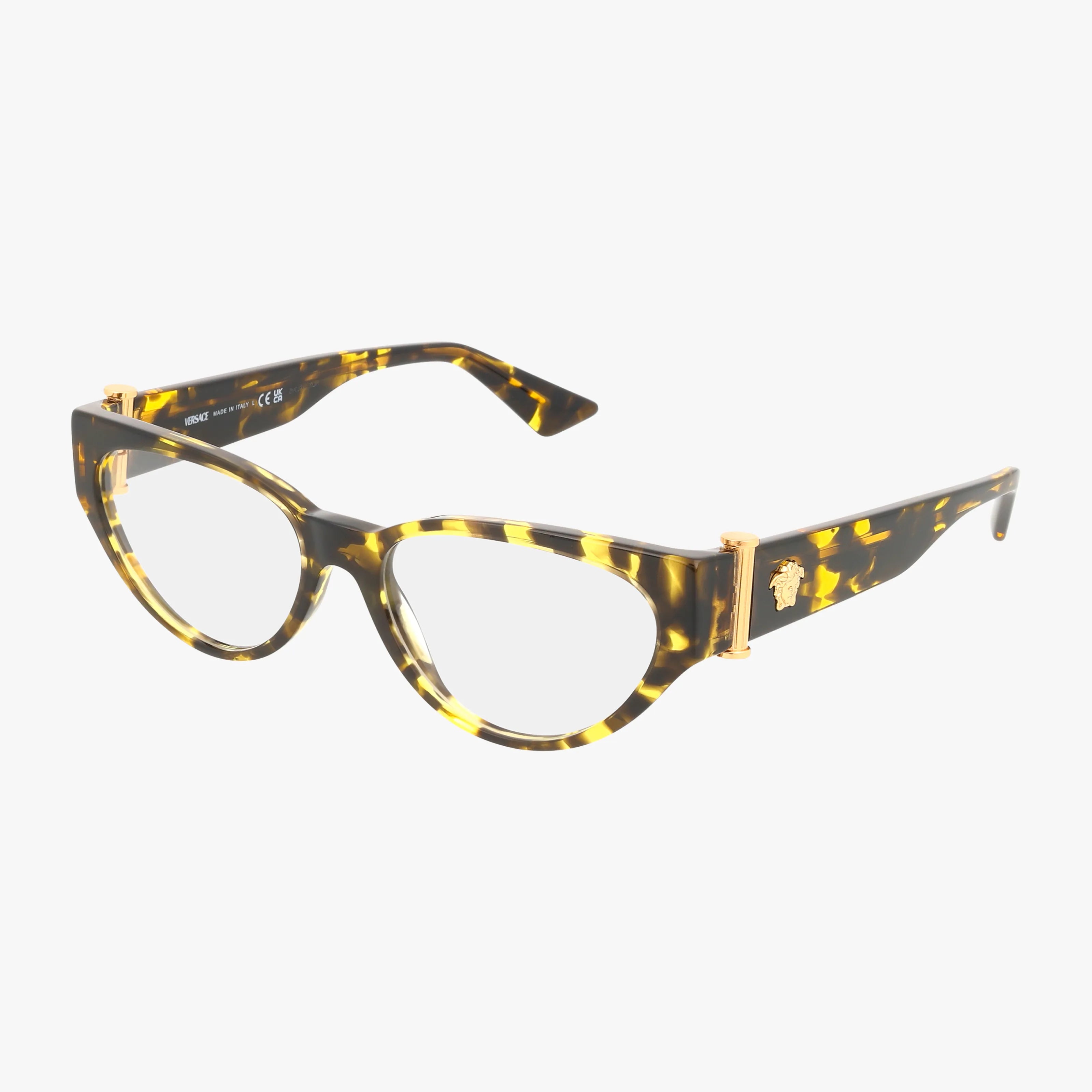 The VE3366 cat-eye eyeglasses feature a brown and yellow tortoiseshell pattern, gold hinge detailing, and clear lenses with a modern frame design—perfect for personalized lens options. Displayed on a white background.