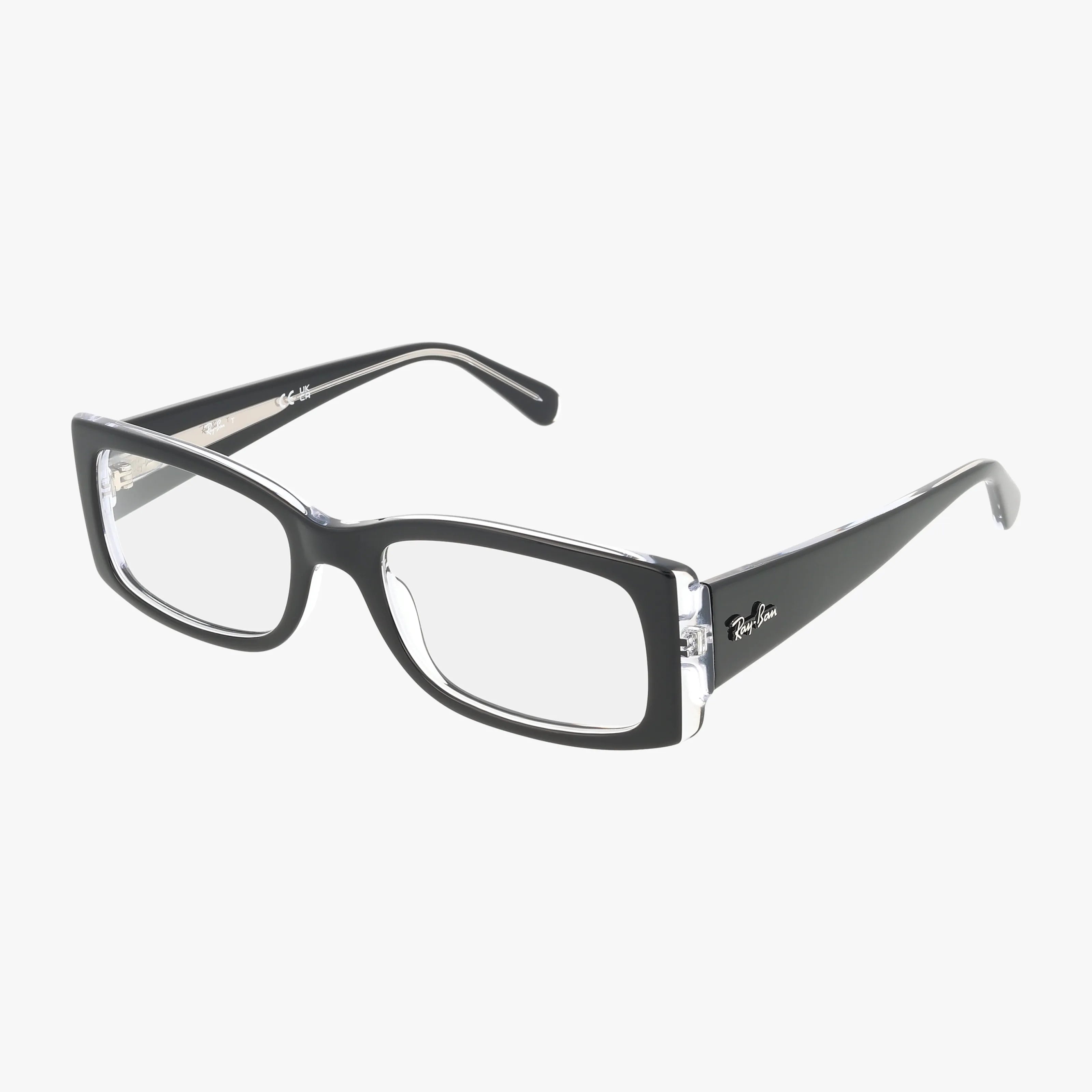 The RX5434 WAYFARER EASE features black rectangular thick frames with clear lenses, showcased on a white backdrop. Its bold design and branded temple arms make these eyeglasses perfect for everyday excellence.