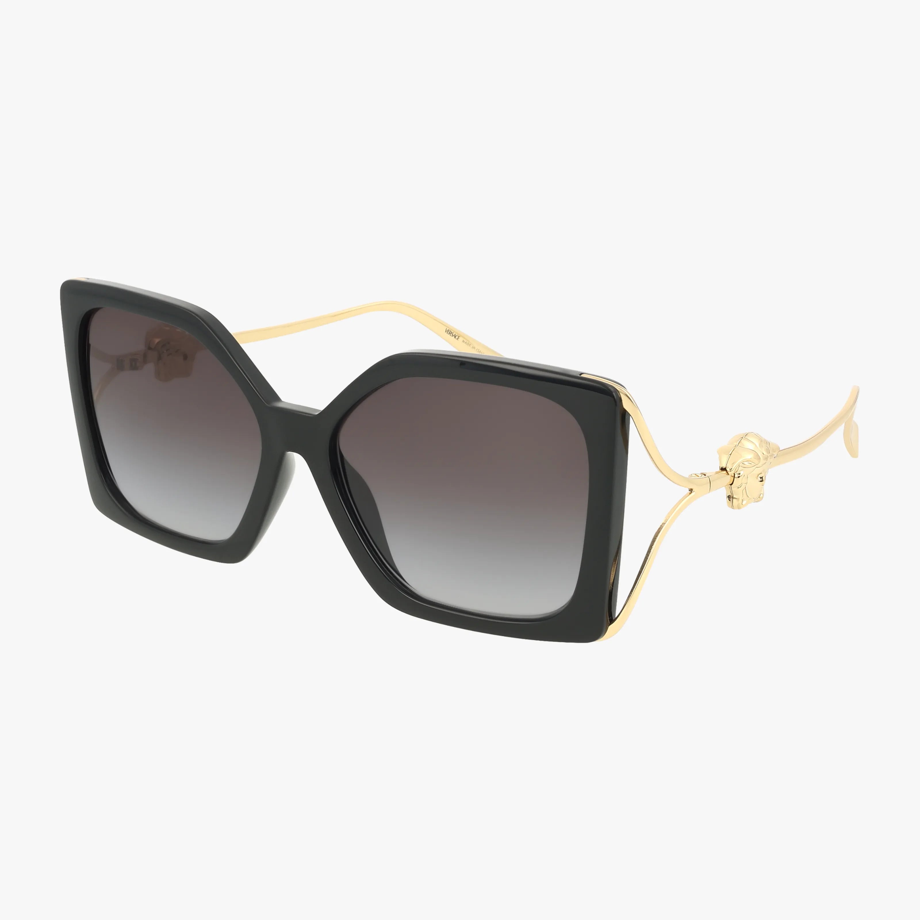 The 4502U features square black oversized frames, gold metal arms, dark gradient lenses, and a decorative gold detail on the temples, displayed against a plain white background.