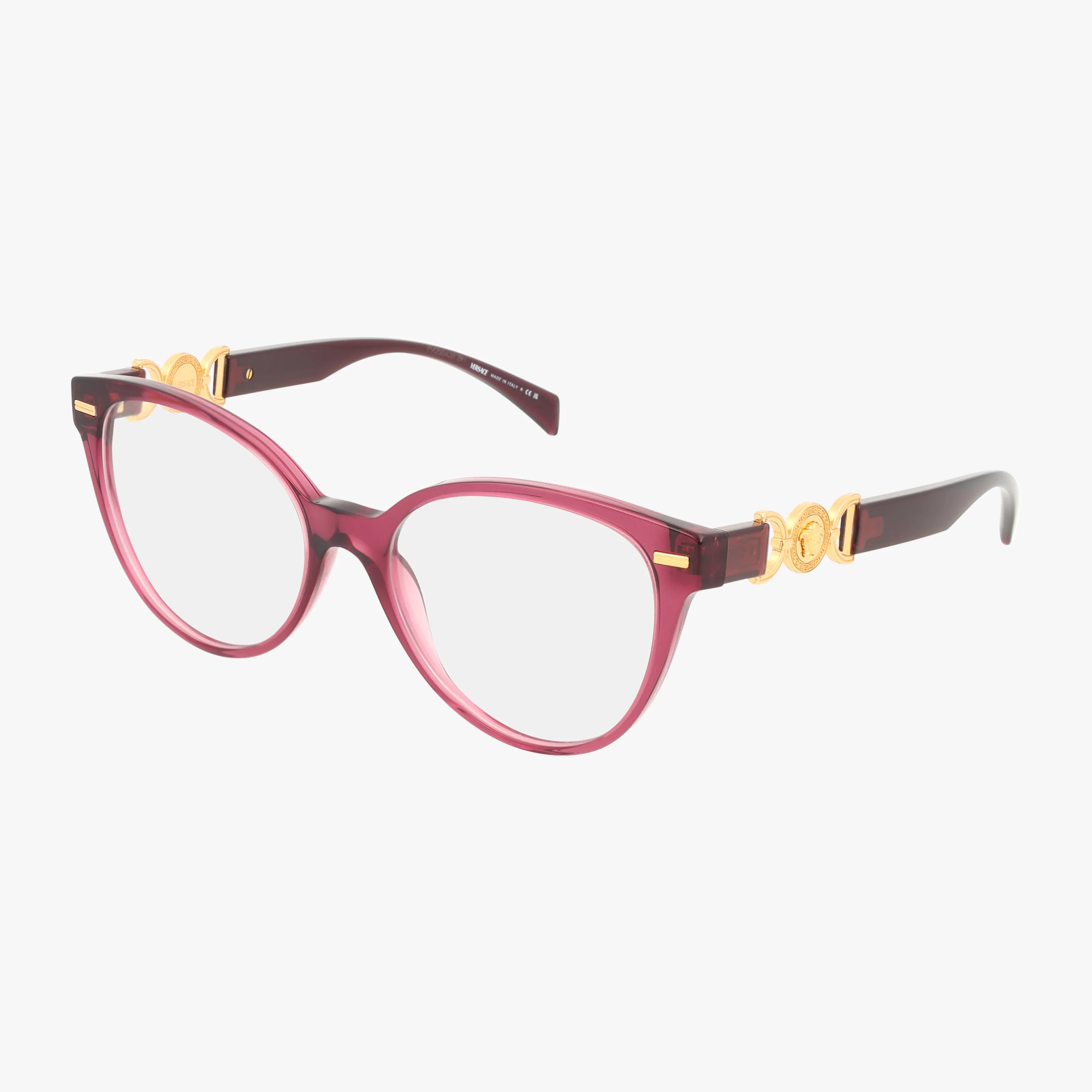 The VE3334 cat-eye eyeglasses feature translucent pink frames, gold accents on the temples, and clear progressive lenses for a sleek look, shown against a white background.