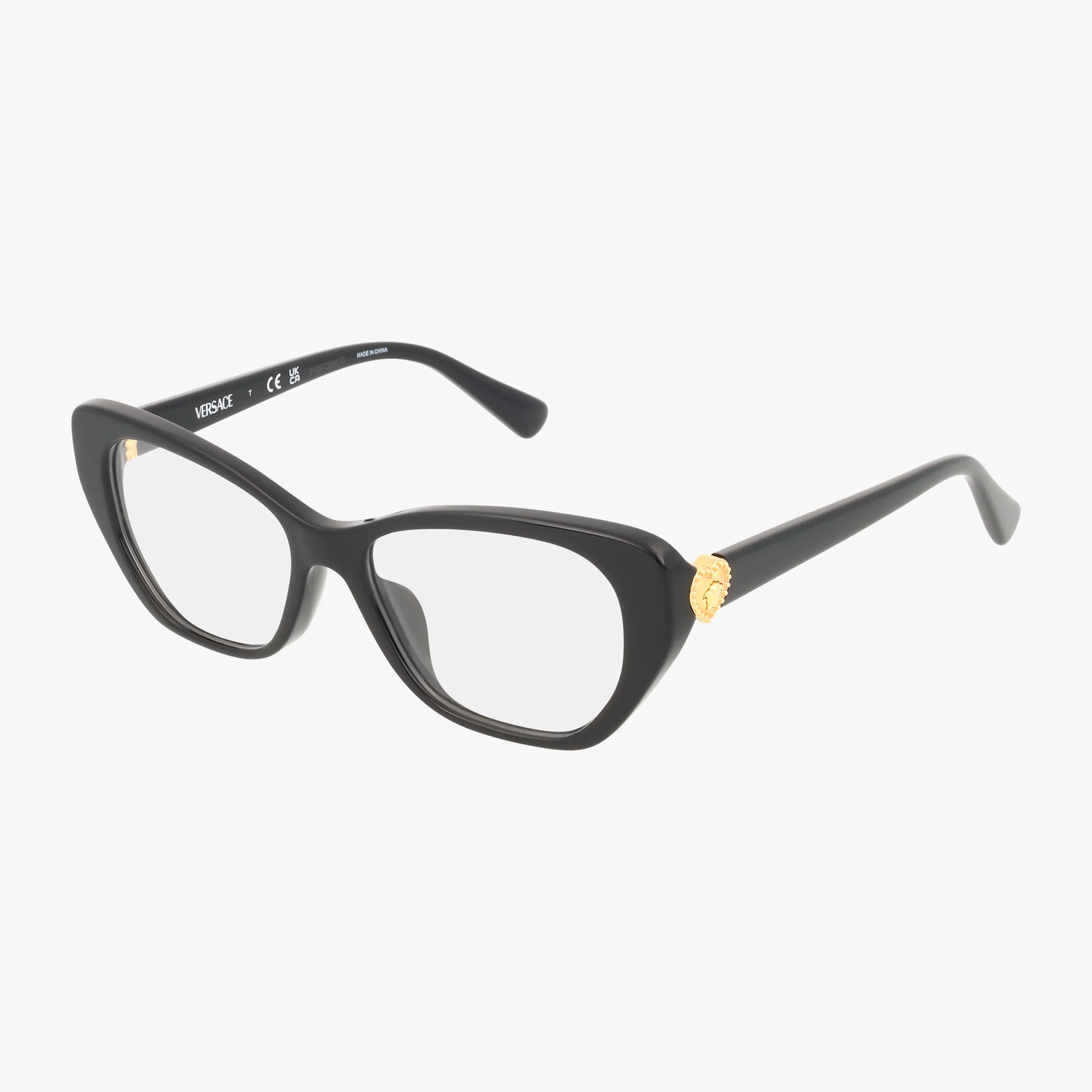 The VK3005U features black cat-eye eyeglasses with a bold, chic frame and a small gold Medusa emblem on the temples, capturing timeless elegance against a white background.