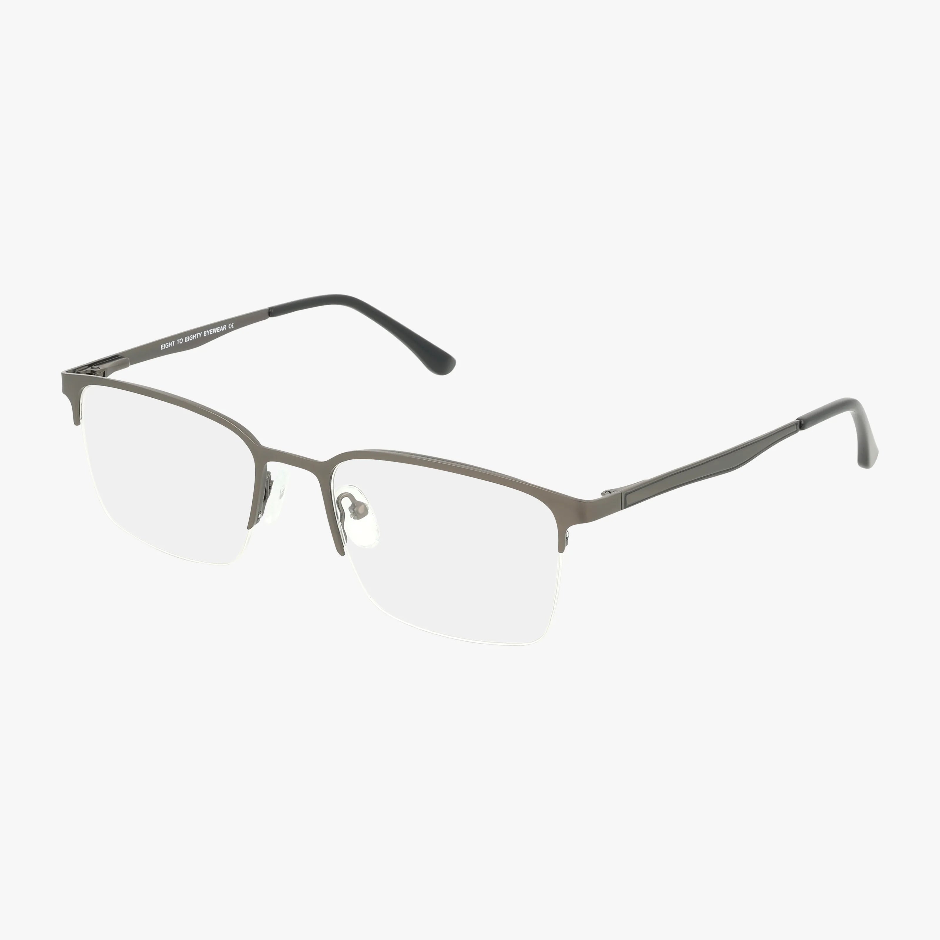 The THOMAS eyeglasses feature a semi-rimless design with thin metallic frames, black temple tips, and progressive lenses for versatile vision, shown on a white background.