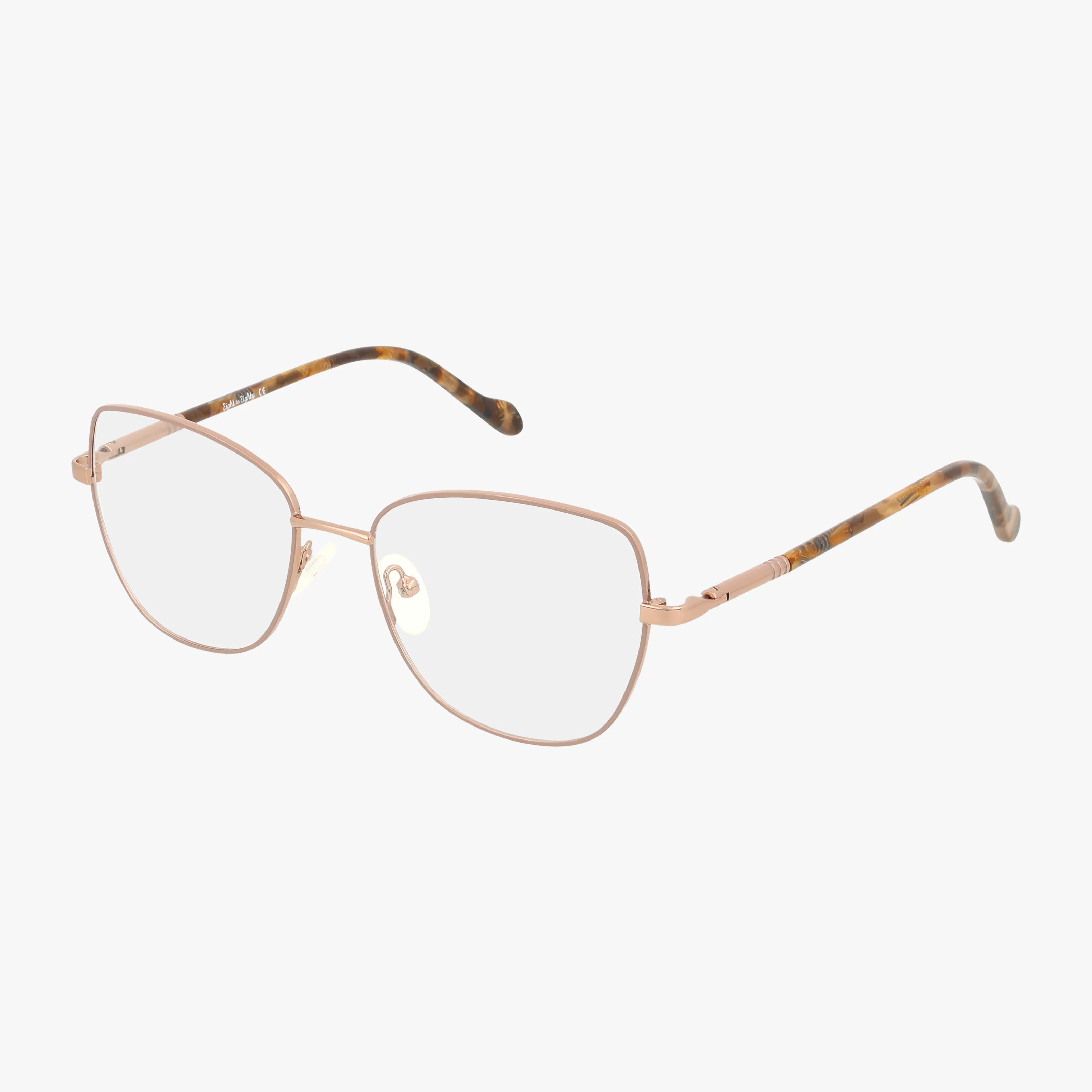 The JEMMA eyeglasses feature a stylish thin gold metal frame with clear lenses. The gold arms start at the hinges and transition to a brown tortoiseshell pattern toward the ends.