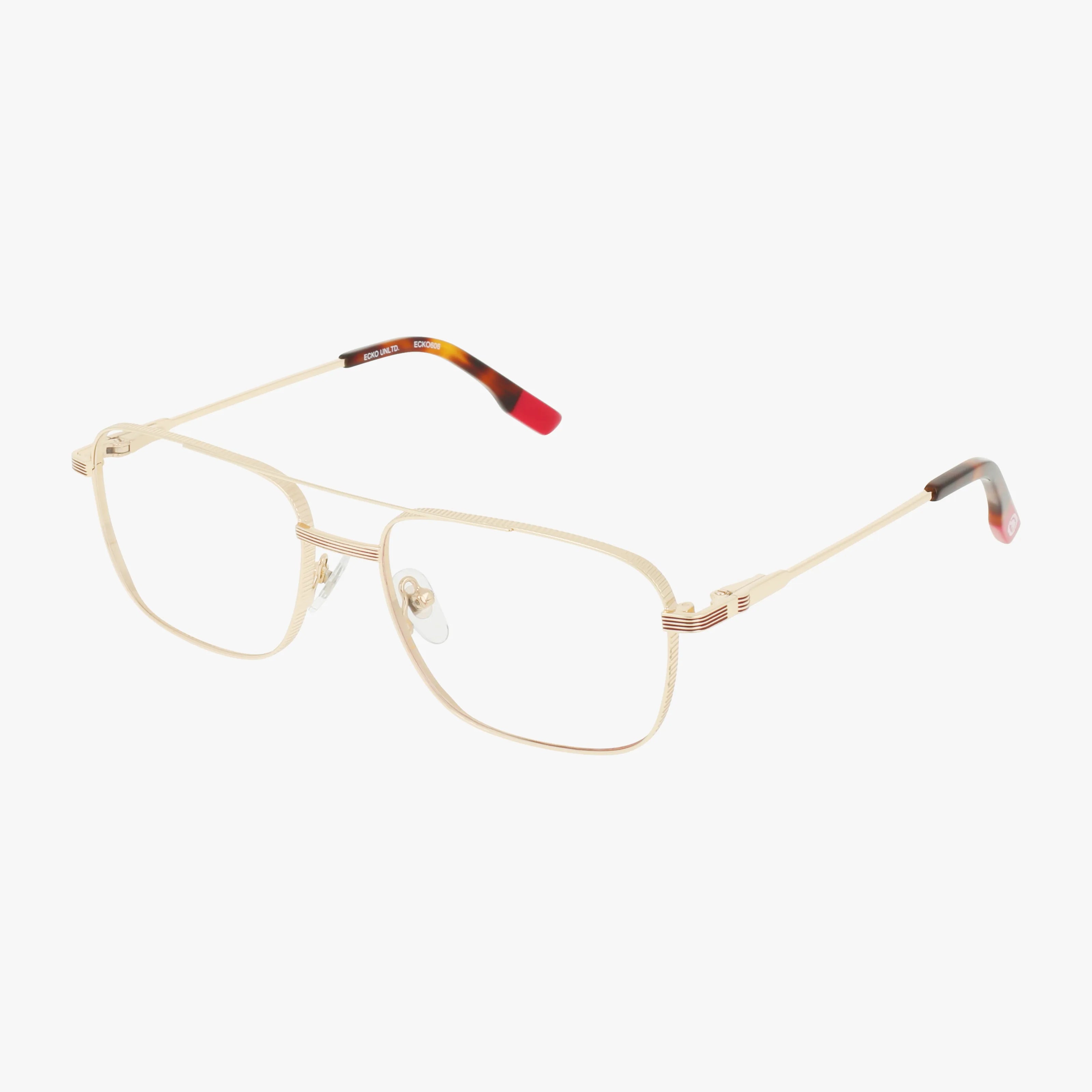 The ECKO606 gold metal eyeglasses feature a tailored rectangular frame, thin arms, and tortoiseshell tips with a hint of red for a distinctive look against a white background.