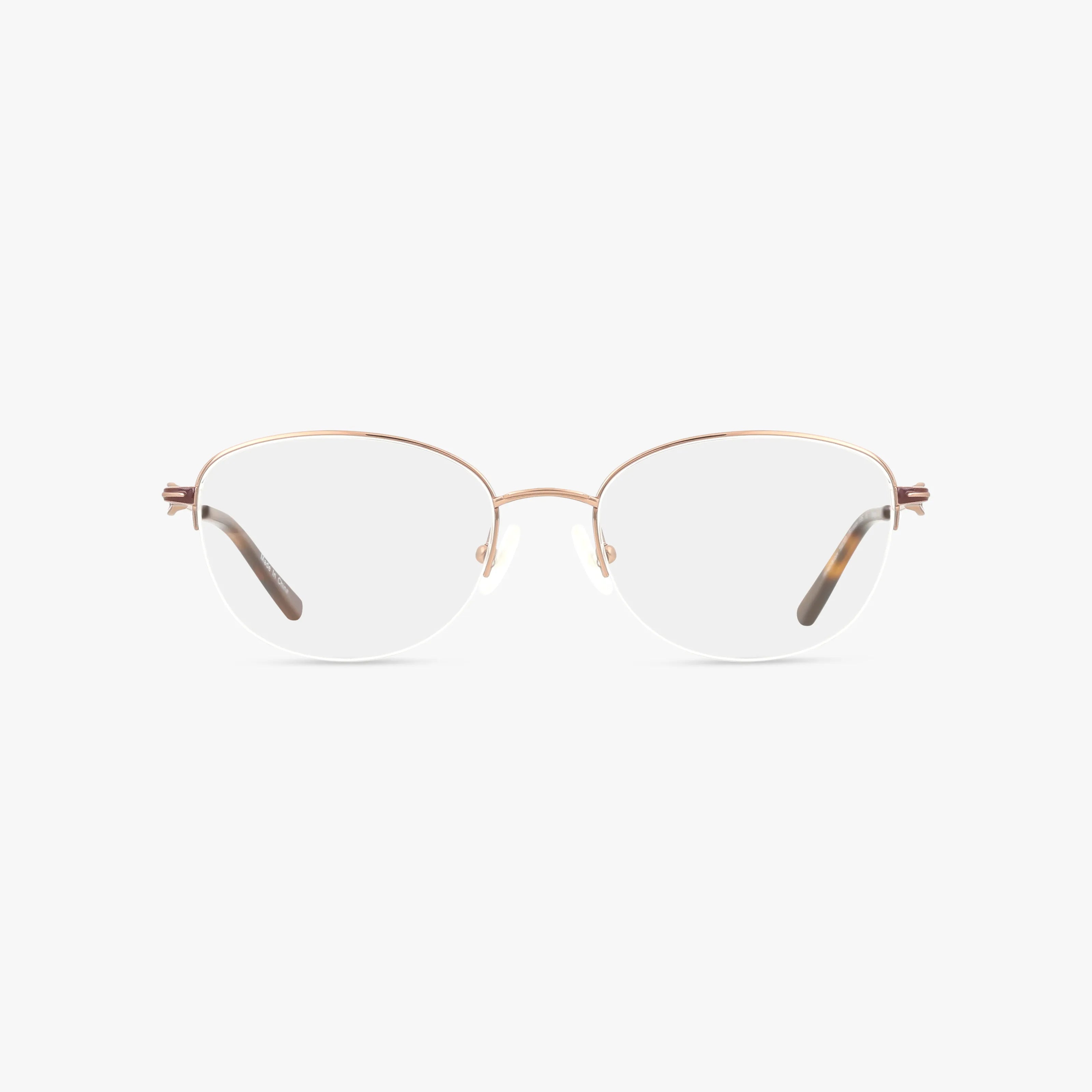 The 500 eyeglasses feature a rimless design with thin gold-tone metal temples and clear prescription lenses, combining modern durability and style, shown against a plain white background.