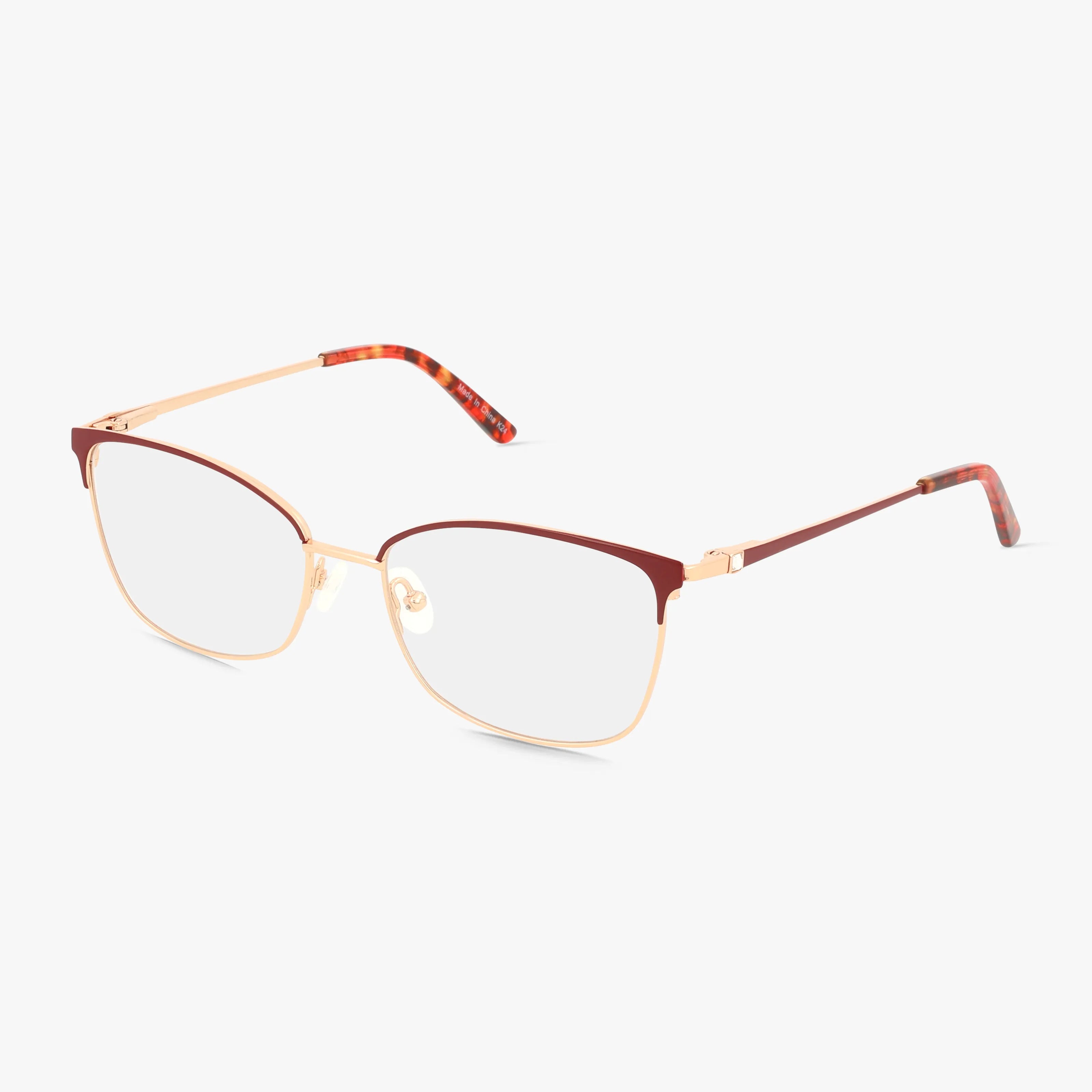The 503 eyeglasses feature thin gold metal frames, red accents on the upper rims, and brownish-red temple tips. With a durable design for lasting wear, they're shown on a white background.