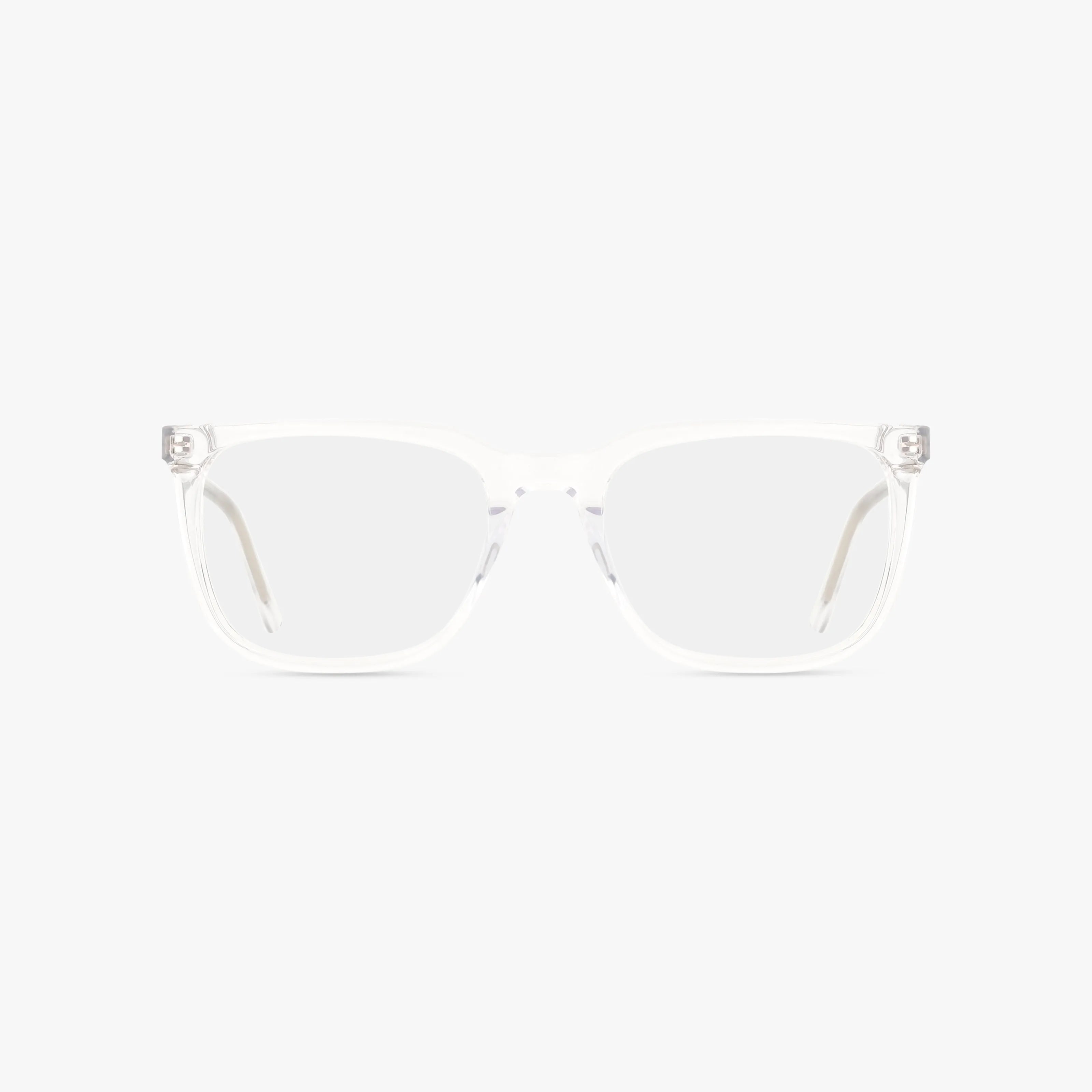 The 1021 eyeglasses feature a clear rectangular design with a polished frame and transparent arms, displayed front-facing against a white background for the perfect mix of style and durability.