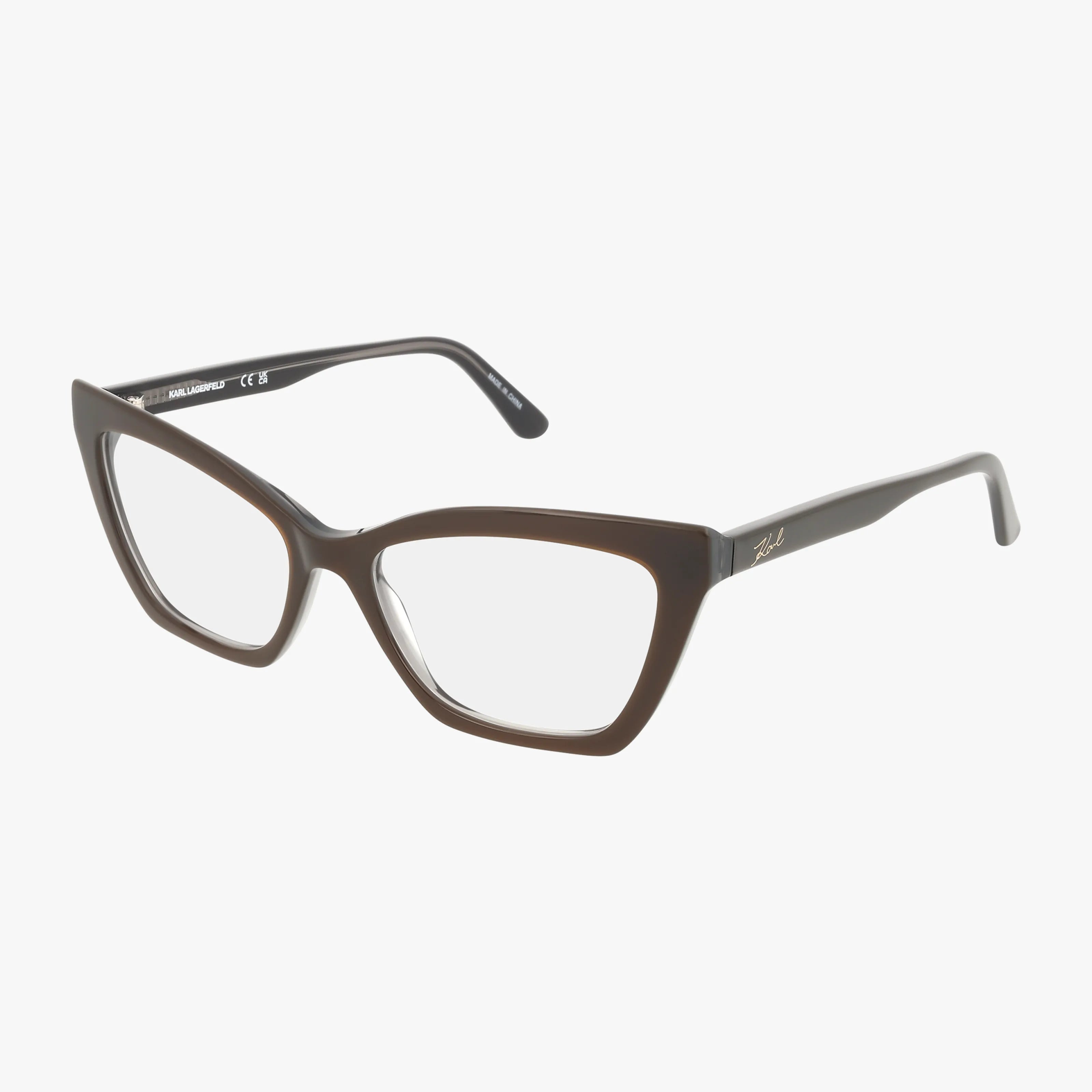 The KL6063 cat-eye eyeglasses feature a stylish frame with thick dark brown rims and clear lenses, shown on a white background.