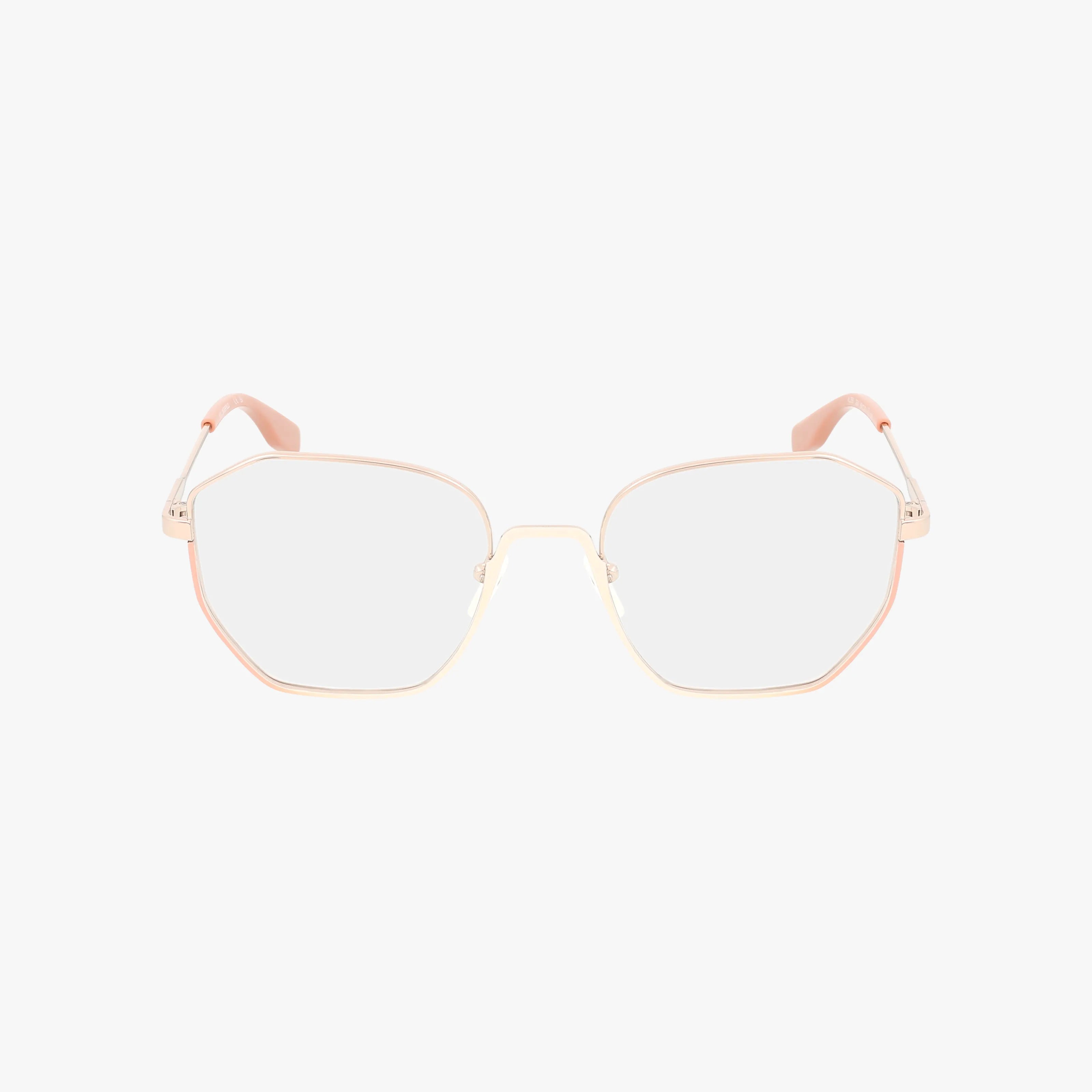 KL356 features gold metal frames with large, slightly hexagonal lenses and light pink temple tips. Designed for everyday excellence, these eyeglasses are shown against a plain white background.