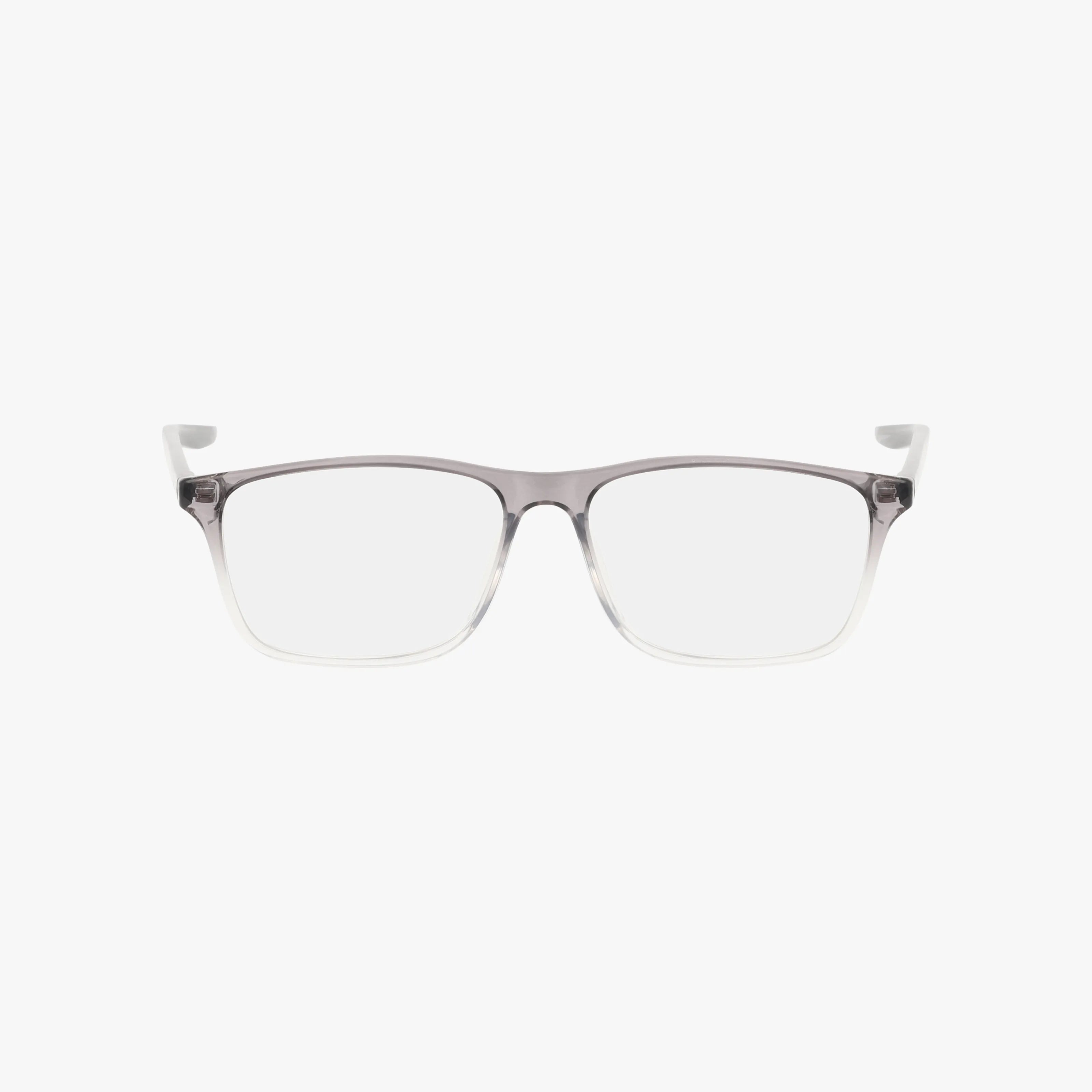 The NIKE 7125 eyeglasses feature a rectangular, translucent gray-to-clear gradient frame with clear lenses, shown front-facing on a white background—ideal for customizable lens options.