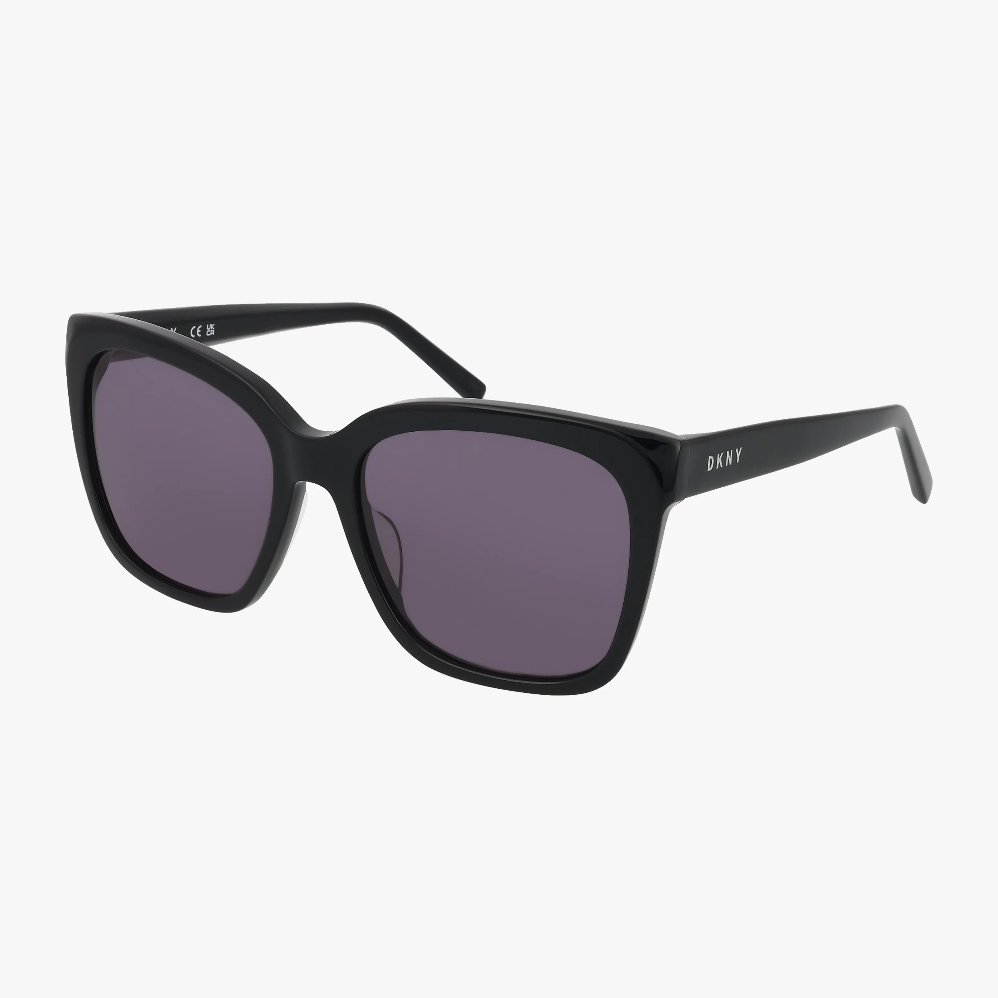 The DK534S sunglasses feature a glossy black square frame with dark tinted lenses for stylish UV protection and the DKNY logo in white on the left temple arm, set against a plain white background.