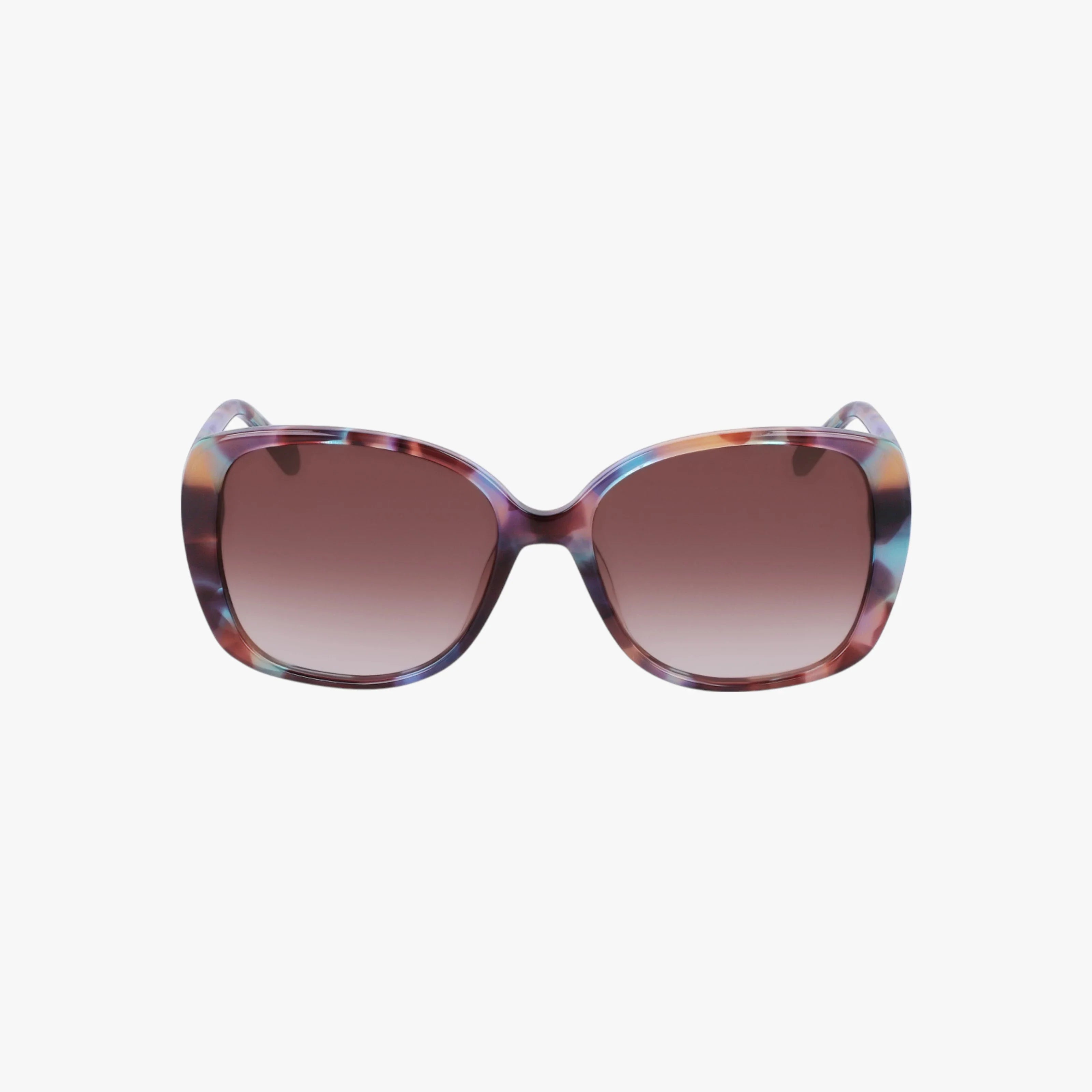 The NW657S sunglasses feature oversized square frames with a multicolored pattern and gradient brown lenses. Built for durability, they suit any occasion and are showcased on a plain white background.