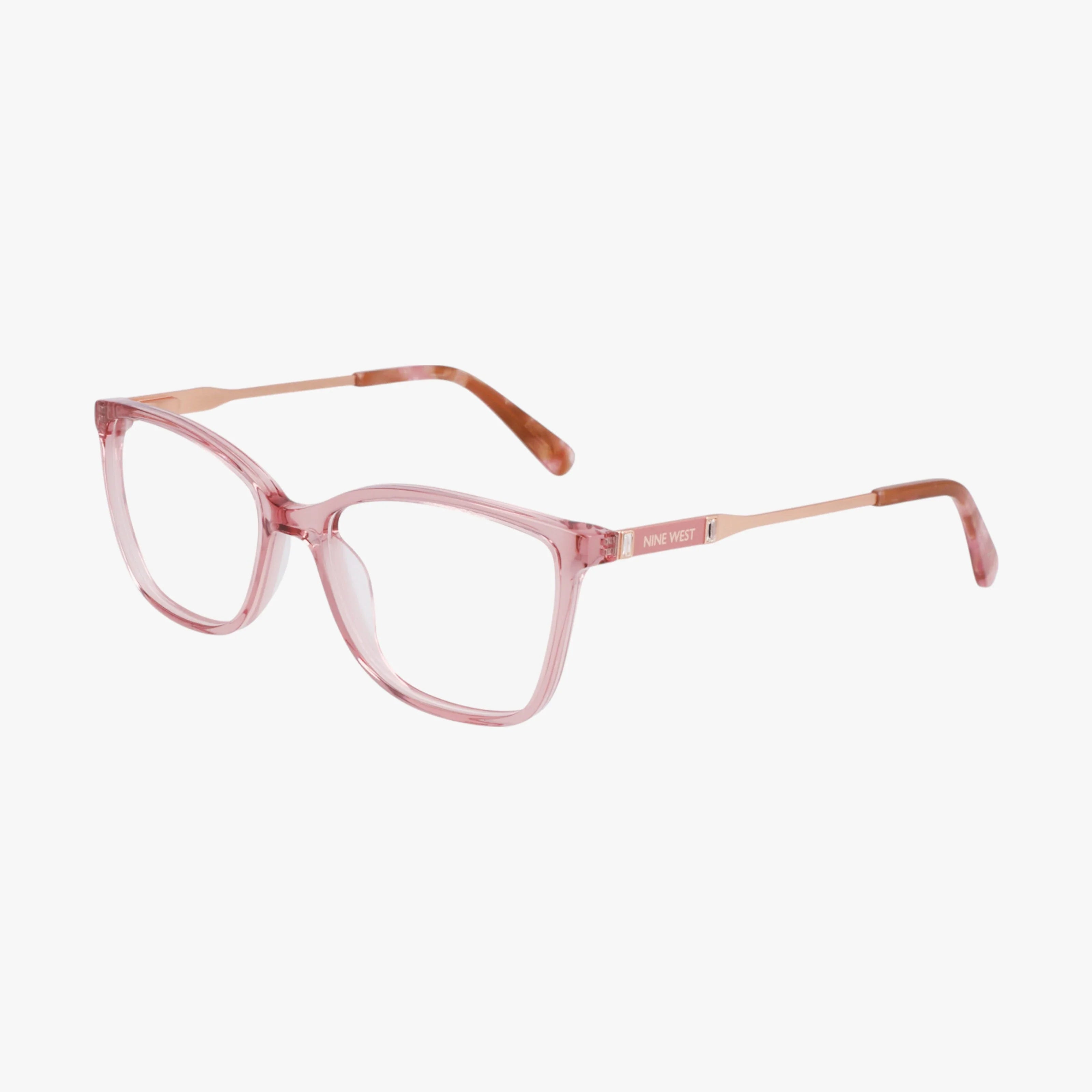 The NW5220 eyeglasses feature pink, semi-transparent rectangular frames with slim matching arms. Lightweight and perfect for daily wear, they are shown angled on a white background.