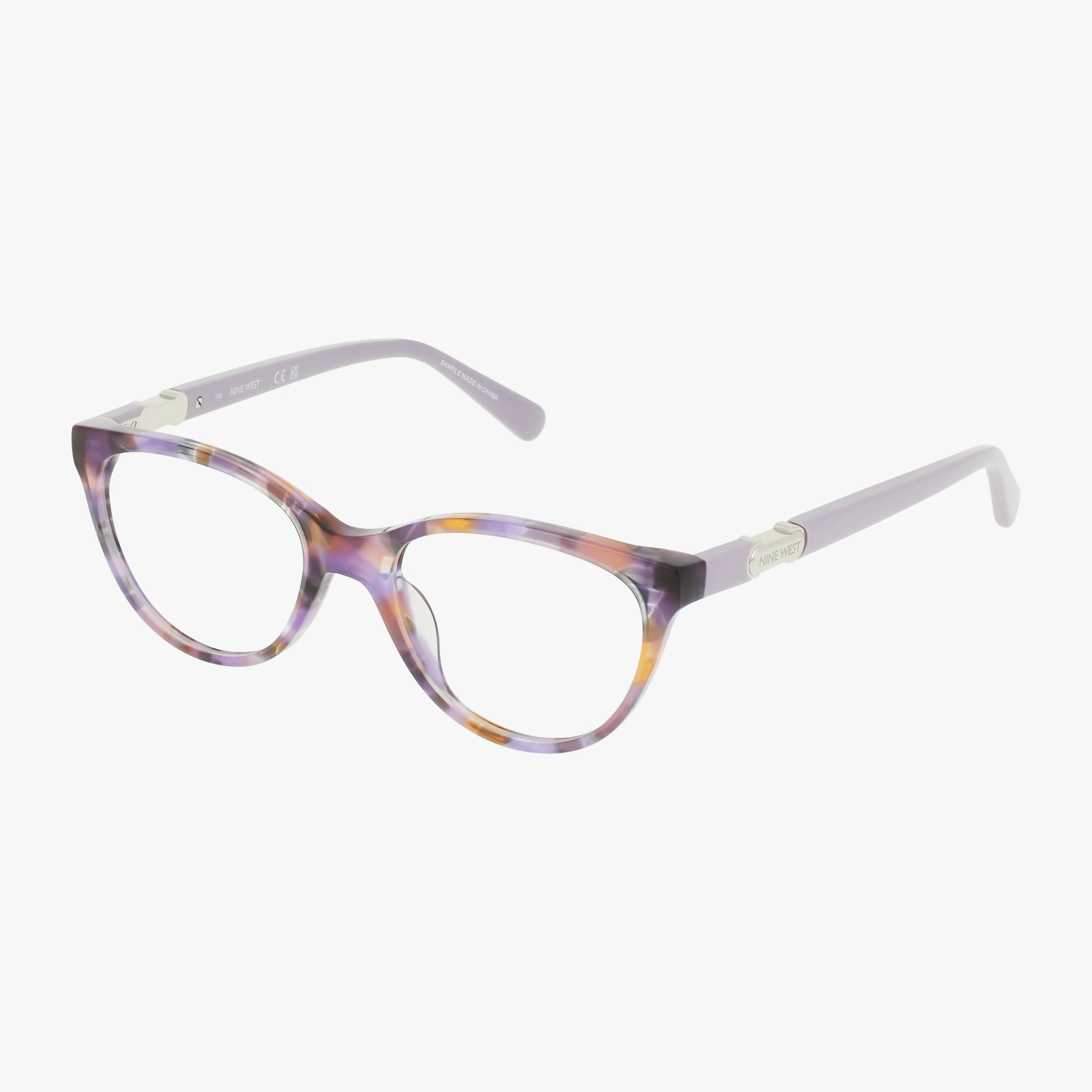 The NW5235 eyeglasses feature slightly translucent purple and yellow tortoiseshell cat-eye frames with silver temple accents, blending timeless style with modern construction, shown against a white background.