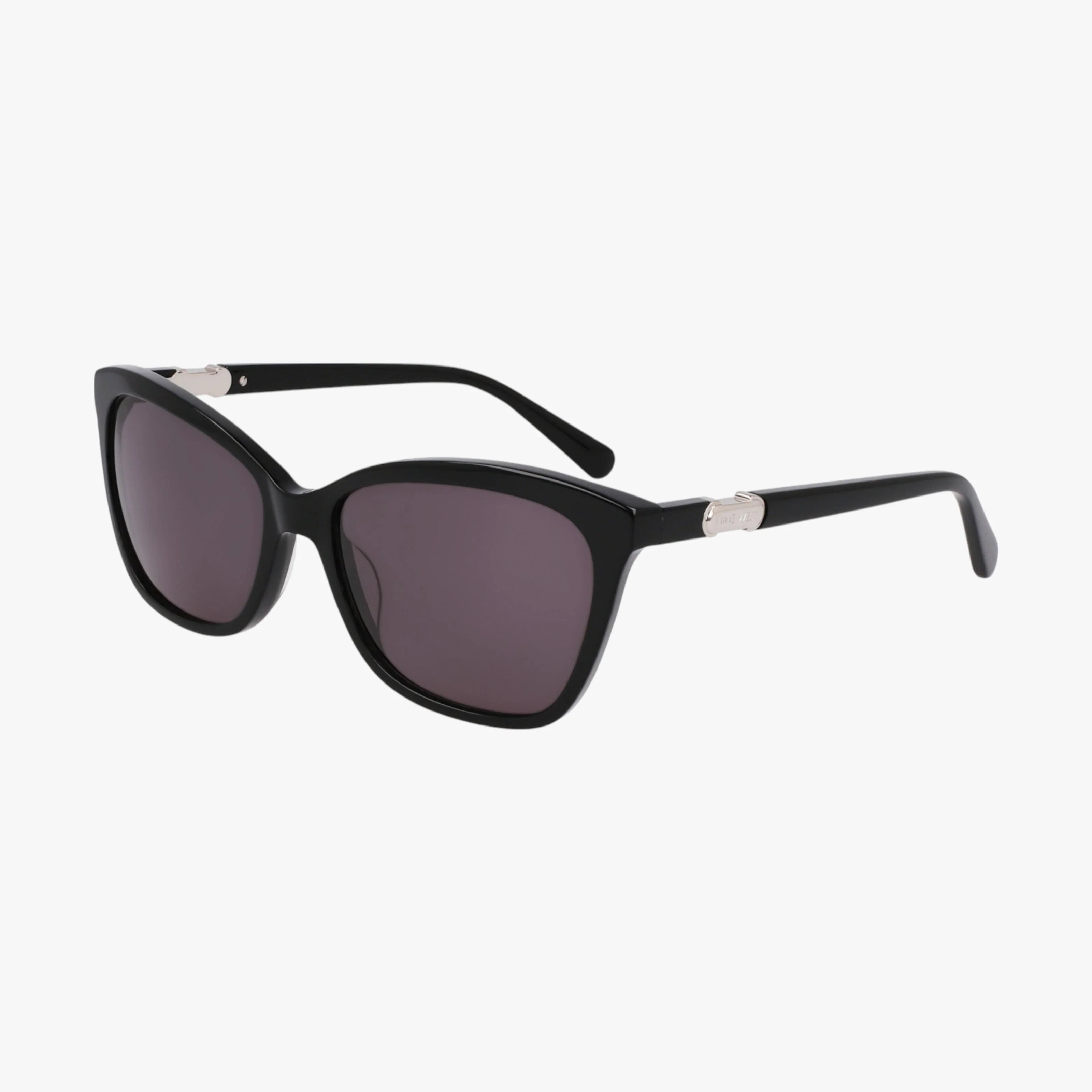 The NW667S sunglasses feature a stylish black cat-eye design with premium dark-tinted lenses and slightly curved arms, shown on a white background.