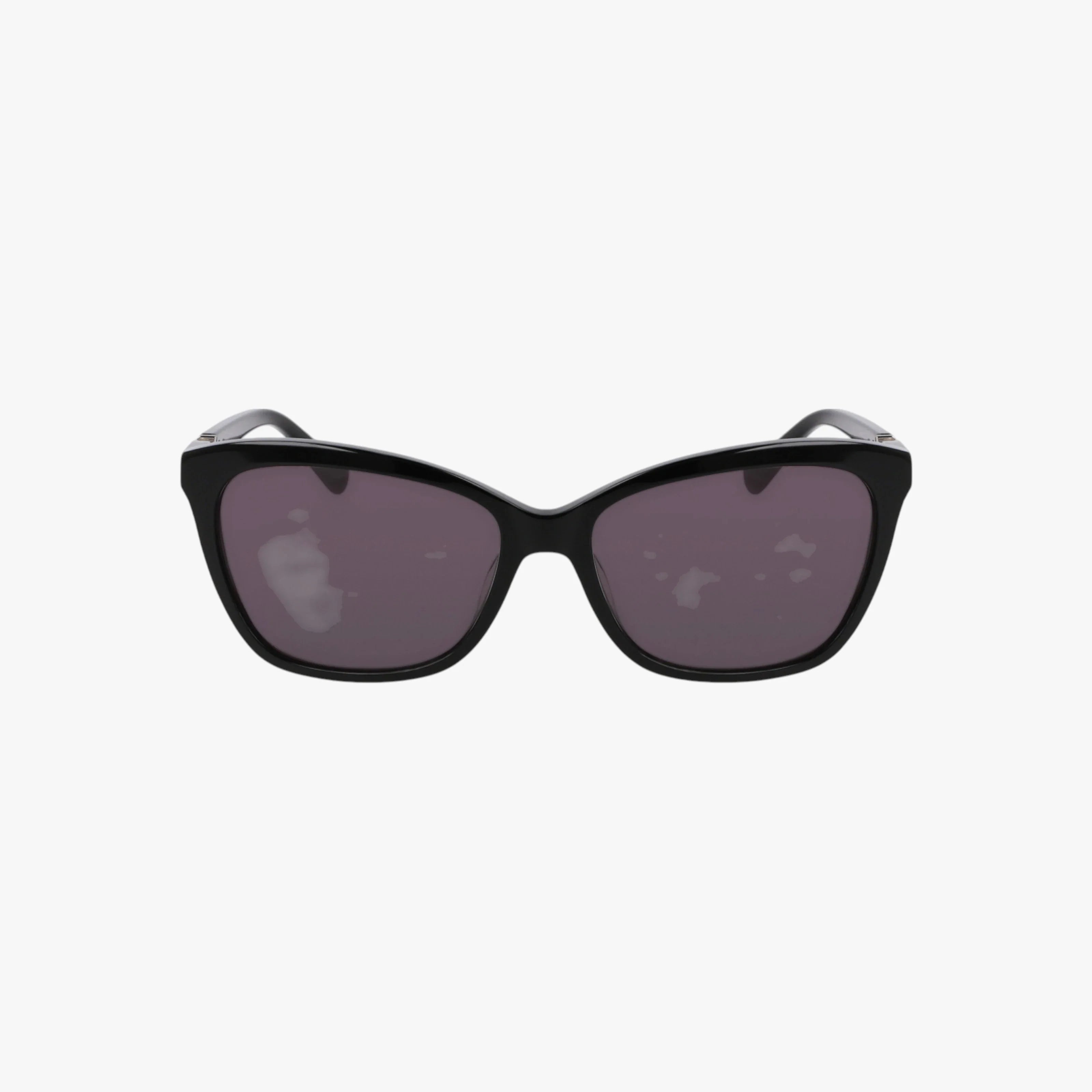 The NW667S is a pair of stylish black cat-eye sunglasses with premium dark-tinted lenses, displayed front-facing on a plain white background.