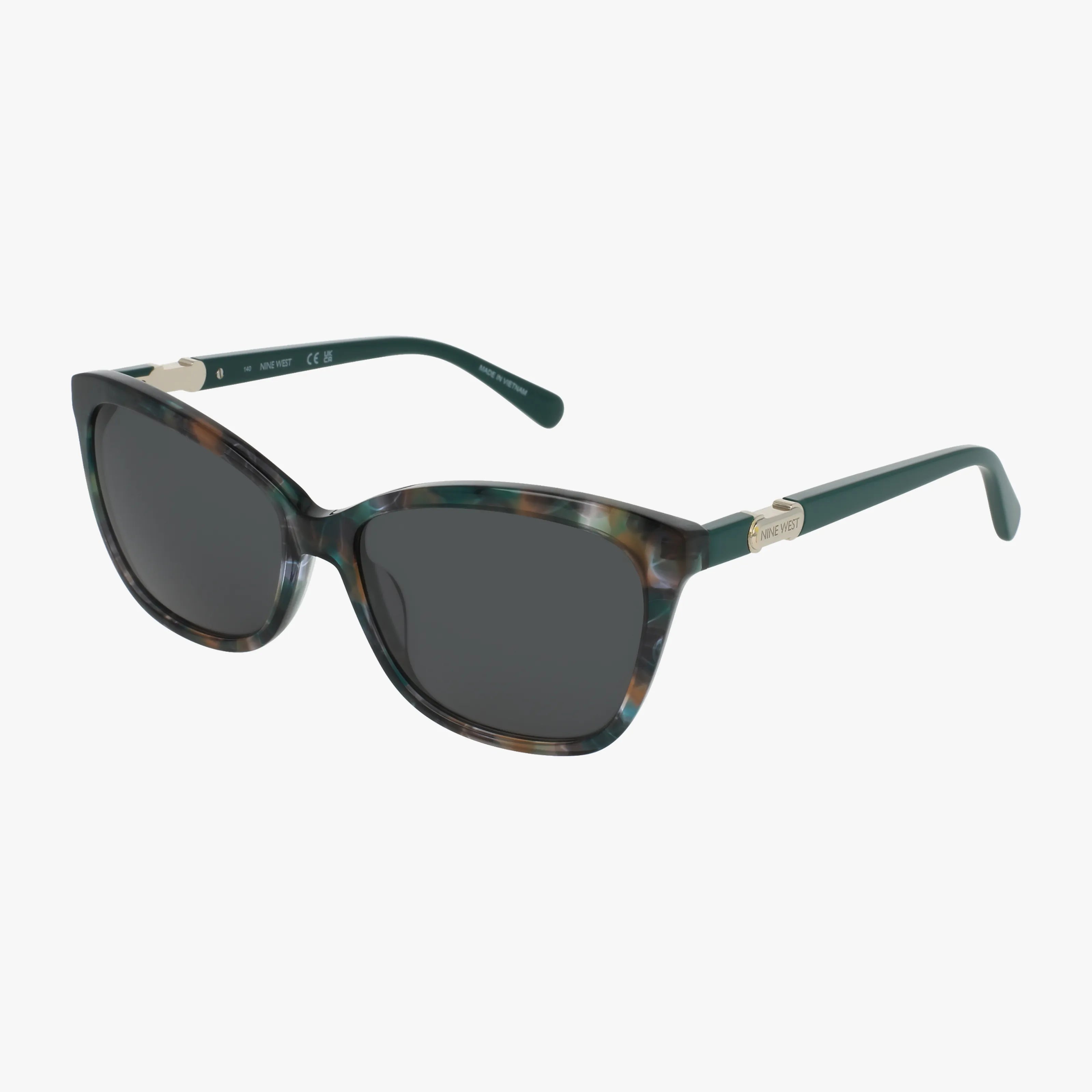 The NW667S cat-eye sunglasses feature premium lenses, dark tints, and a multicolored green and brown marbled frame with gold-accented hinges.