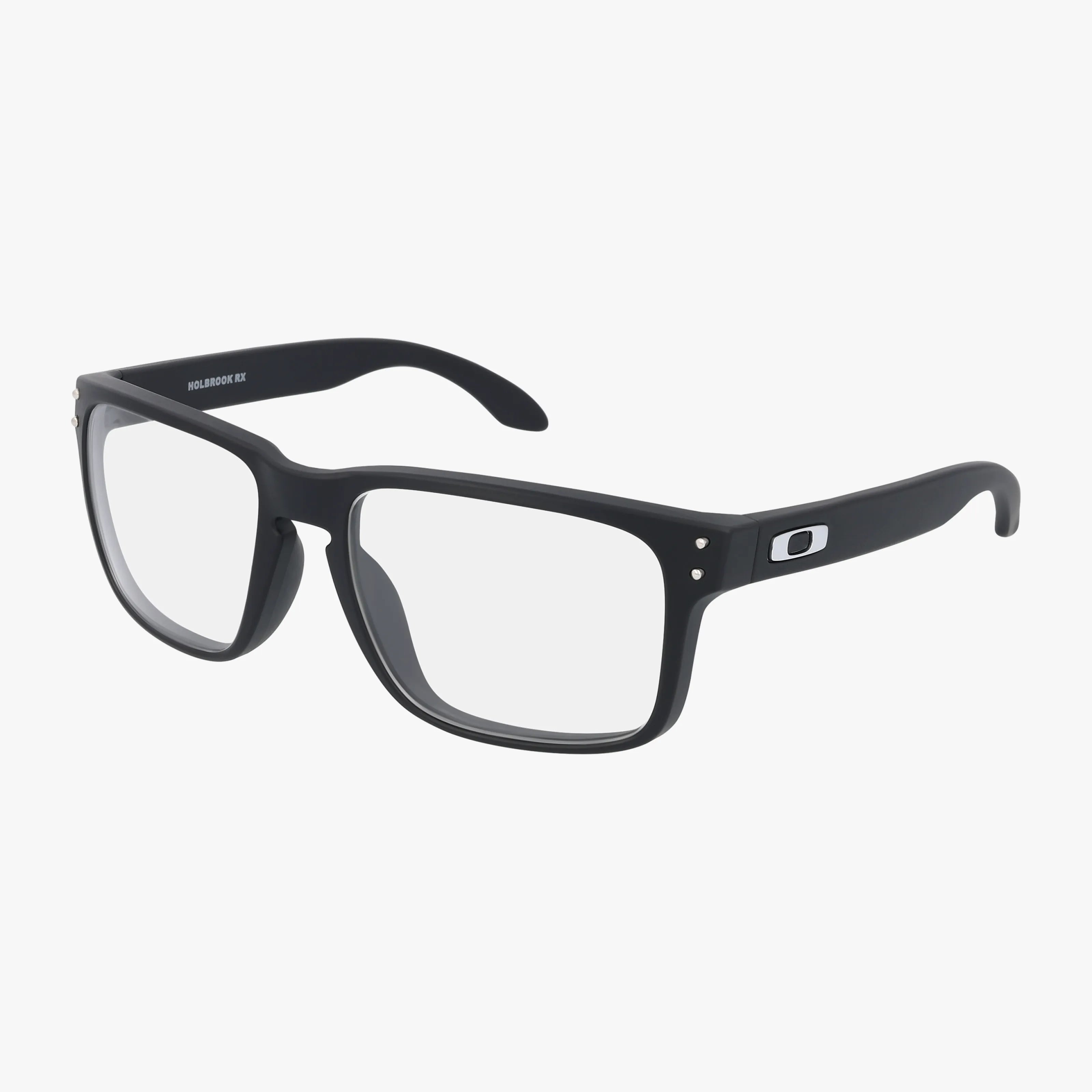 The OX8156 HOLBROOK RX eyeglasses feature a black rectangular frame with clear lenses and a small Oakley logo, displayed on a white background—ideal for anyone wanting stylish eyewear from an online collection.