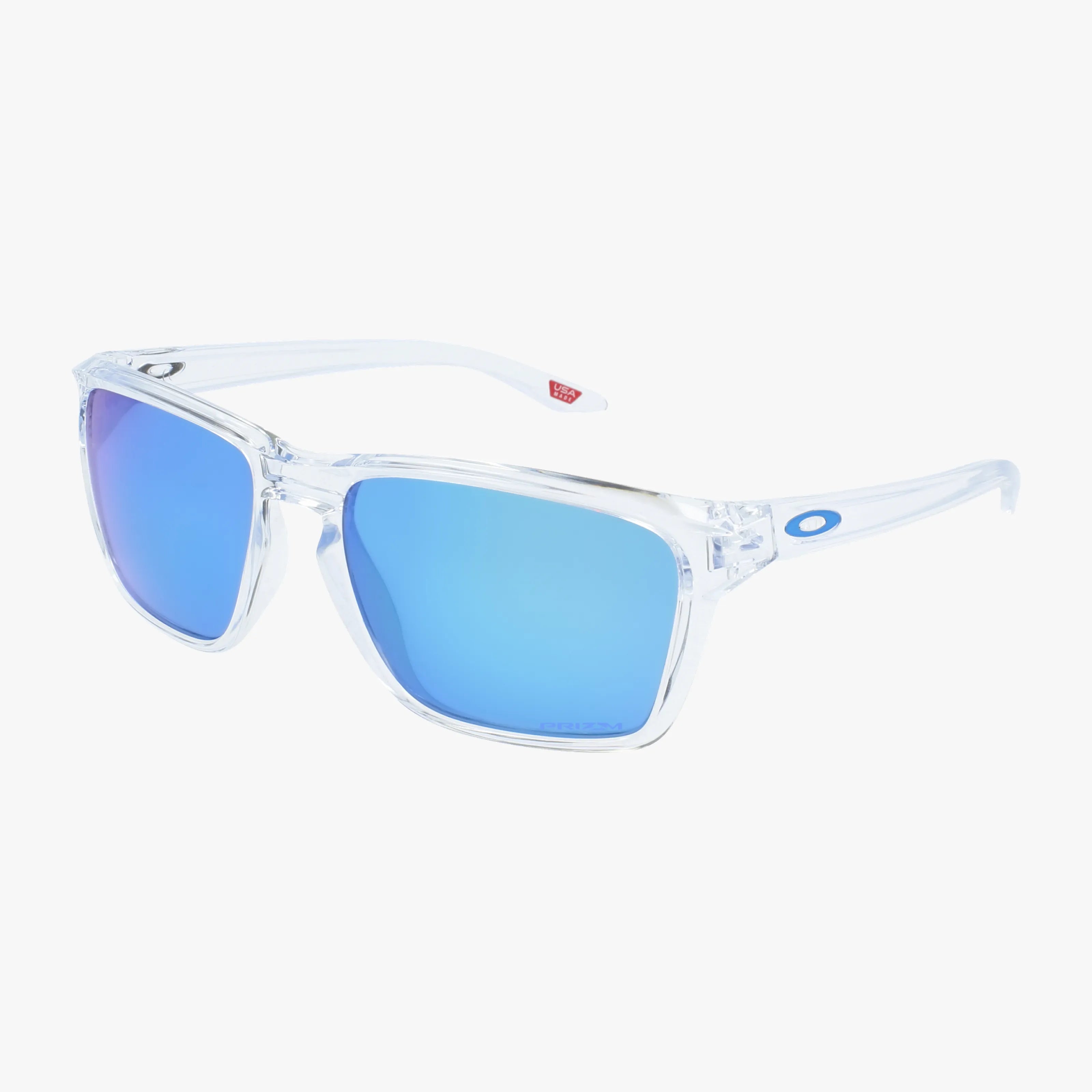 The OO9448 SILVER STEALTH sunglasses feature clear frames, bright blue mirrored lenses, thin arms, and a small blue Oakley logo on the temple—delivering cutting-edge style against a white background.