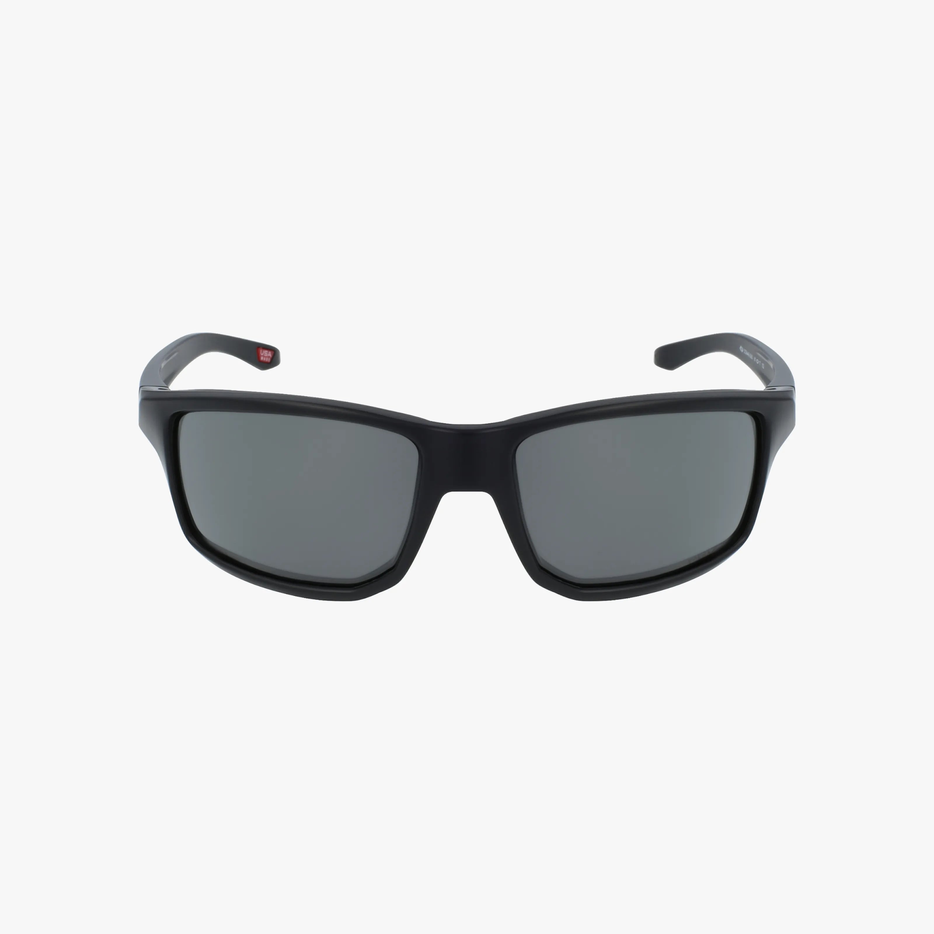 Front view of OO9449 GIBSTON sunglasses with a black, durable rectangular frame and dark tinted lenses, featuring slightly curved arms, photographed on a plain white background.