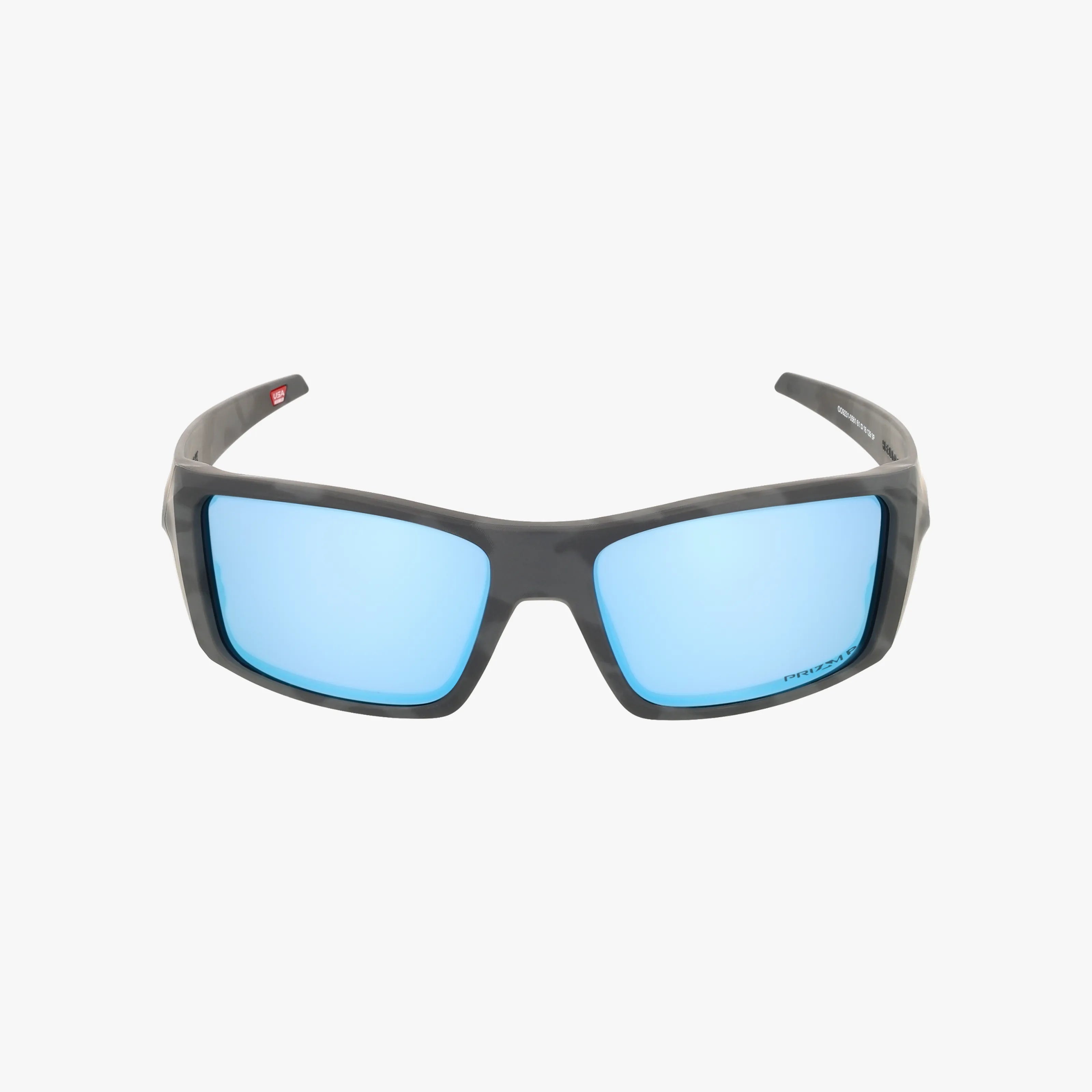 A pair of OO9231 HELIOSTAT sporty, rectangular sunglasses with a dark grey frame and reflective blue premium lenses, shown on a plain white background.