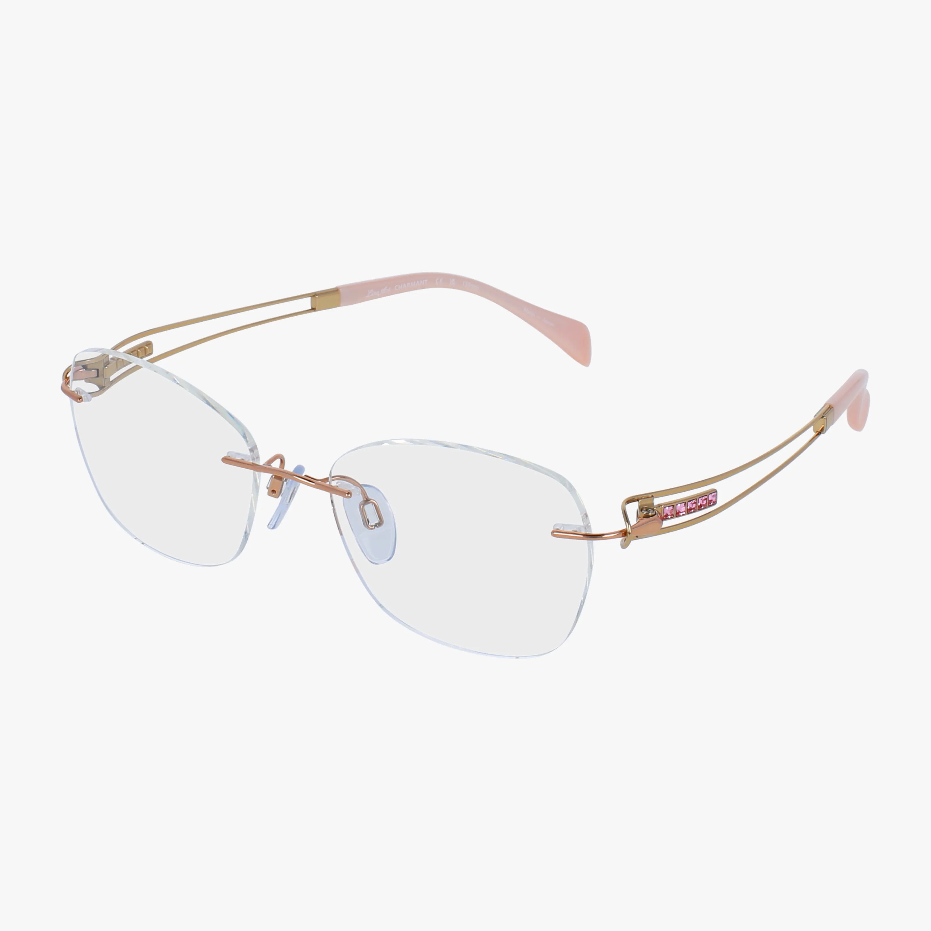 The XL2174 rimless eyeglasses feature gold temples, pink tips, and decorative pink and gold accents on the arms, combining a minimalist frame with modern durability, displayed on a white background.