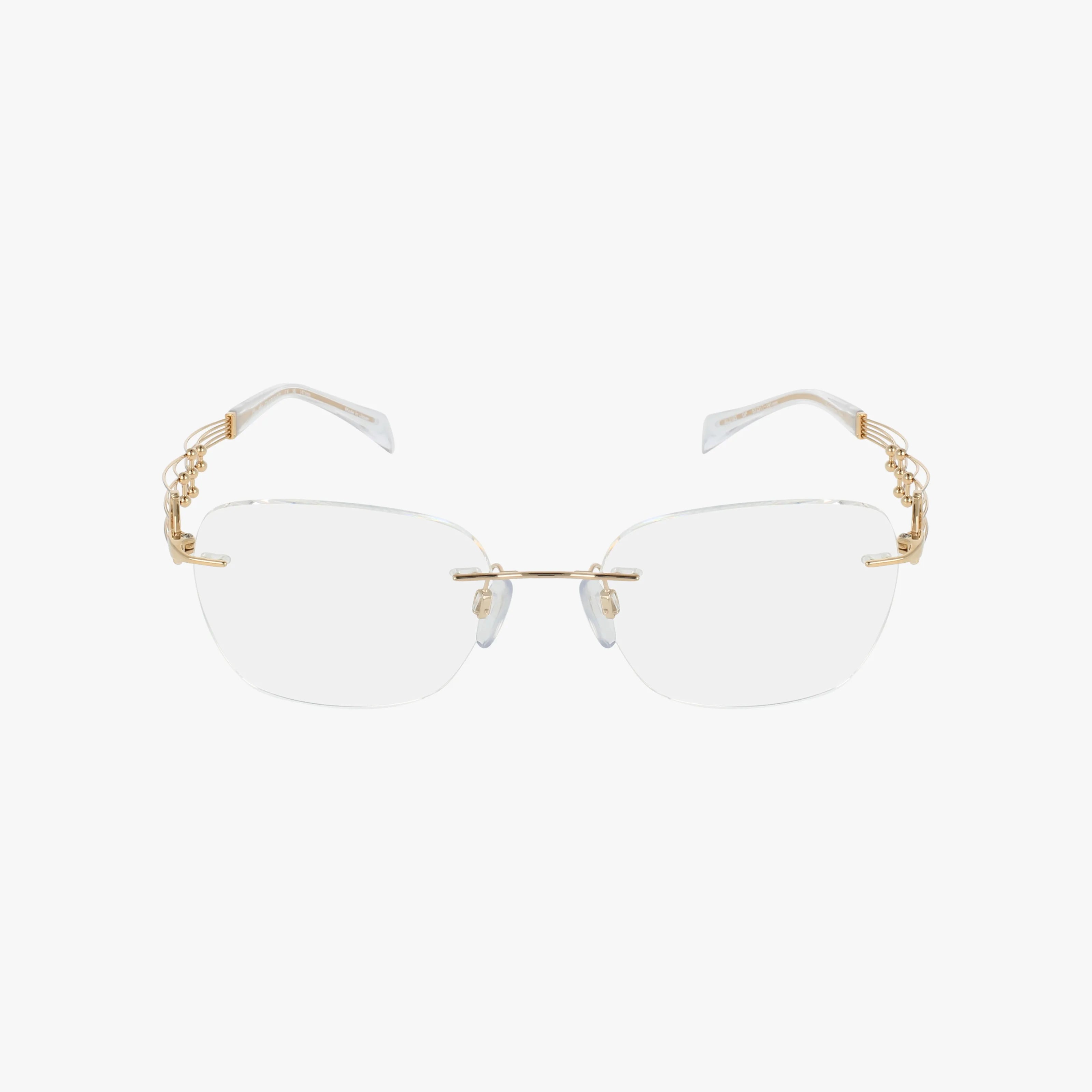 The 2183 eyeglasses are lightweight and rimless with clear prescription lenses, feature gold metal arms and decorative hinge detailing, and are displayed on a white background.