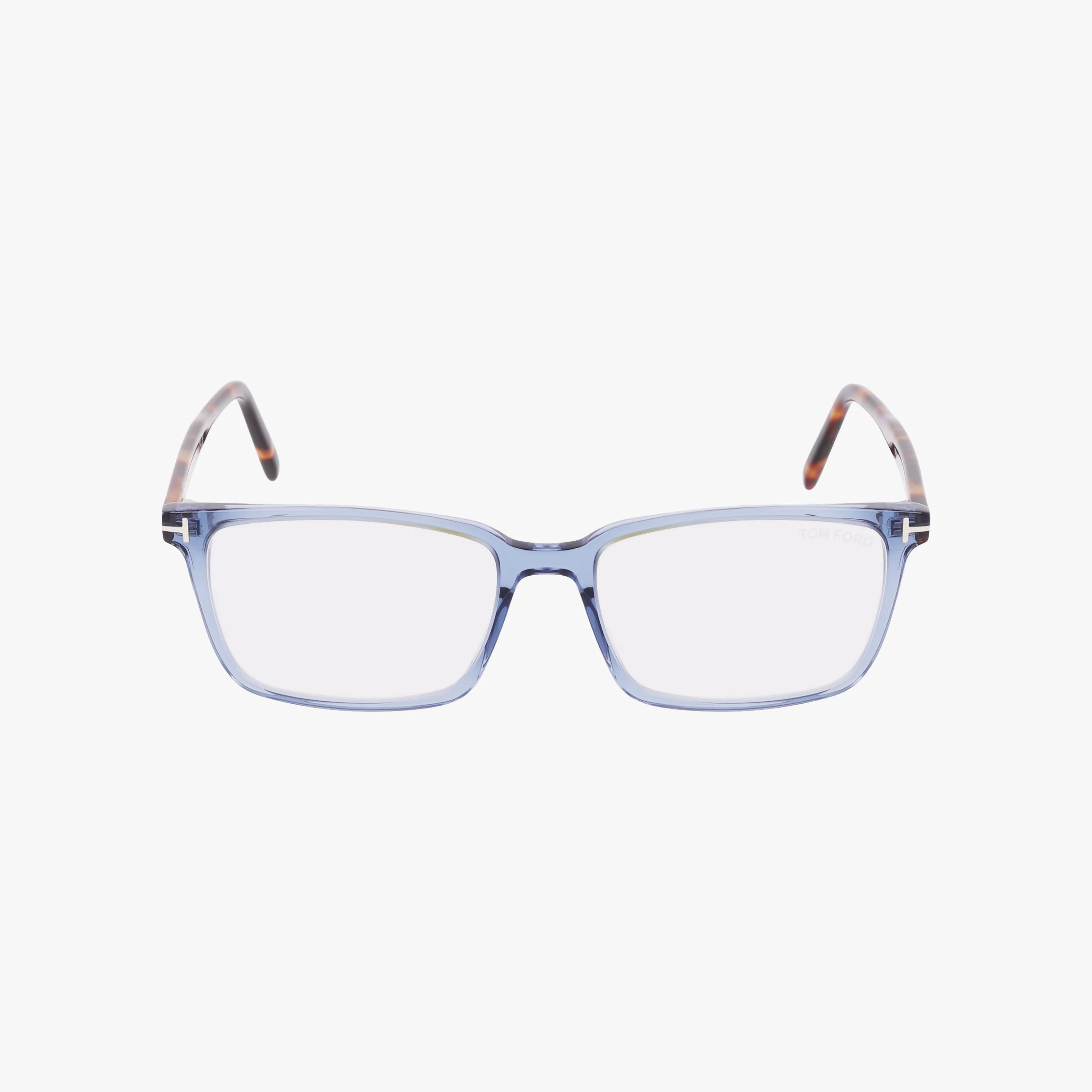 The FT5802B features rectangular, transparent light blue frames with brown and beige patterned temple arms in a modern design, displayed against a plain white background.