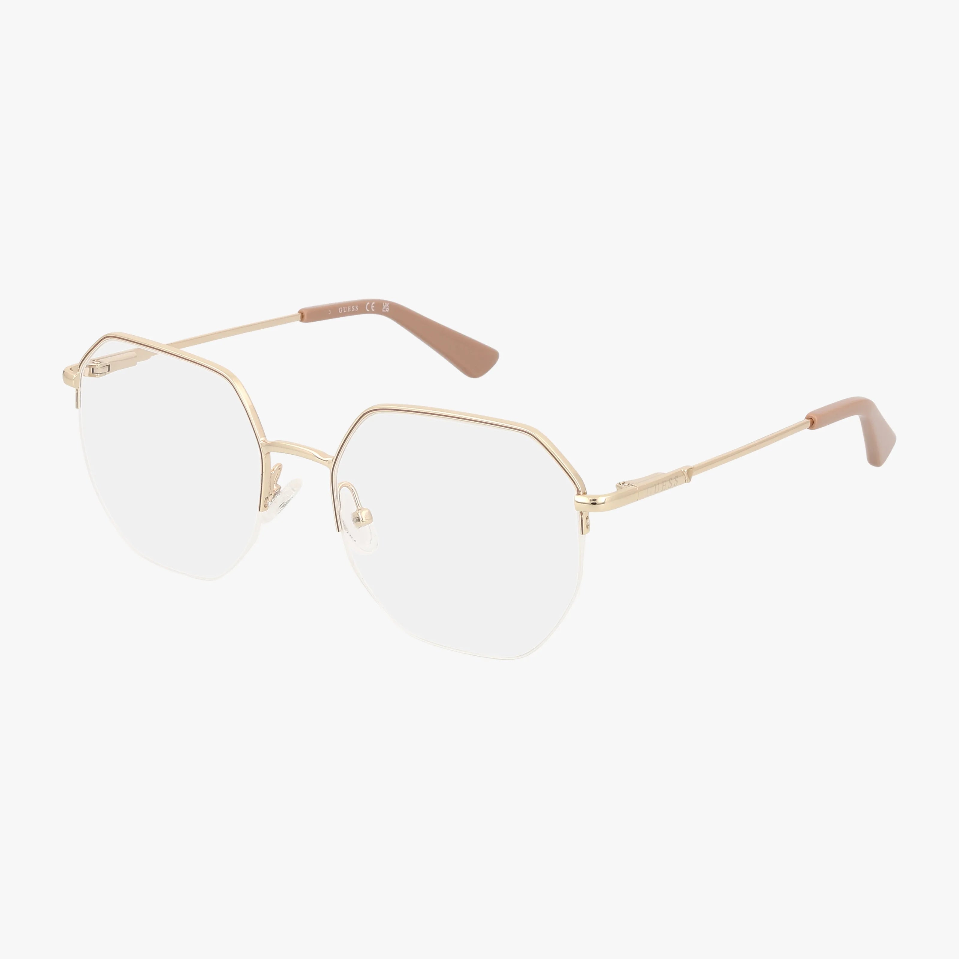 The GU2935 features gold, octagon-shaped metal frames with clear lenses and light brown temple tips, inspired by chic 80s fashion, shown against a white background.