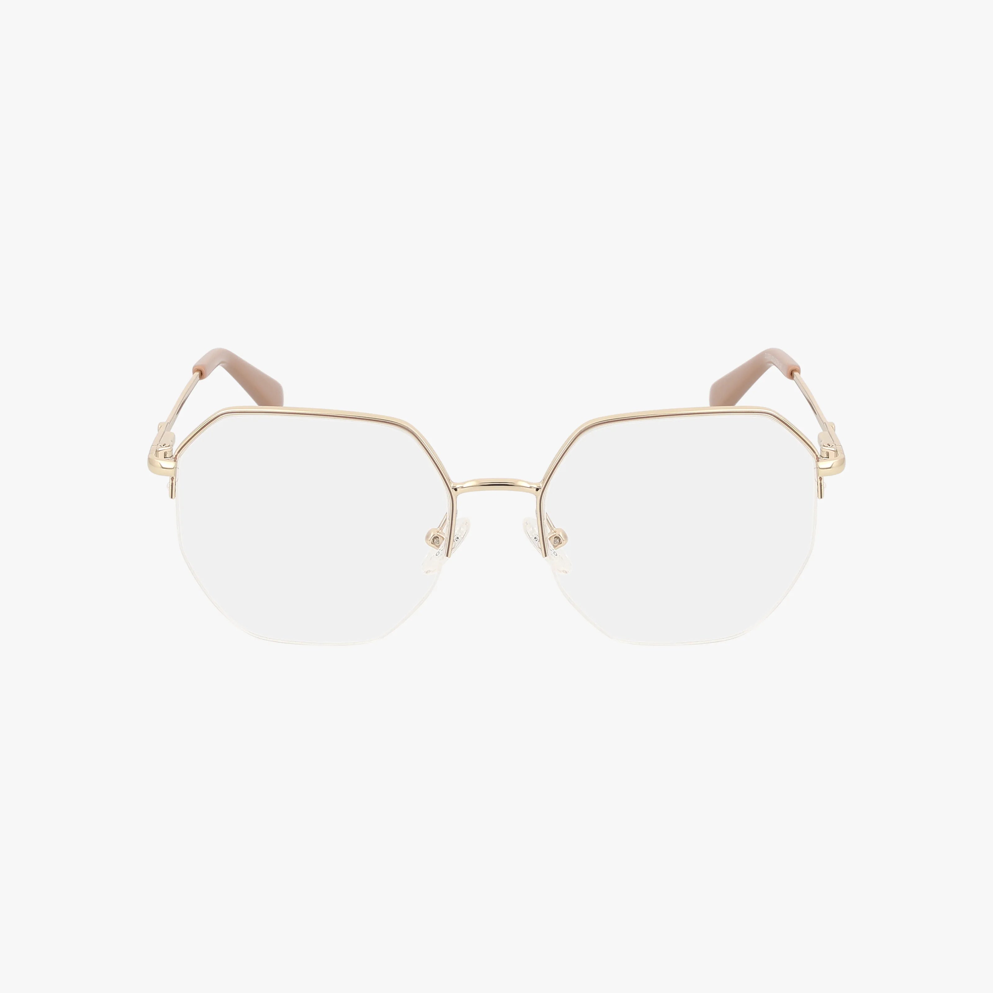 The GU2935 features gold octagon-shaped geometric lenses with clear nose pads, shown on a white background. Inspired by 80s fashion, the oversized temples include a subtle brown detail at the ends.