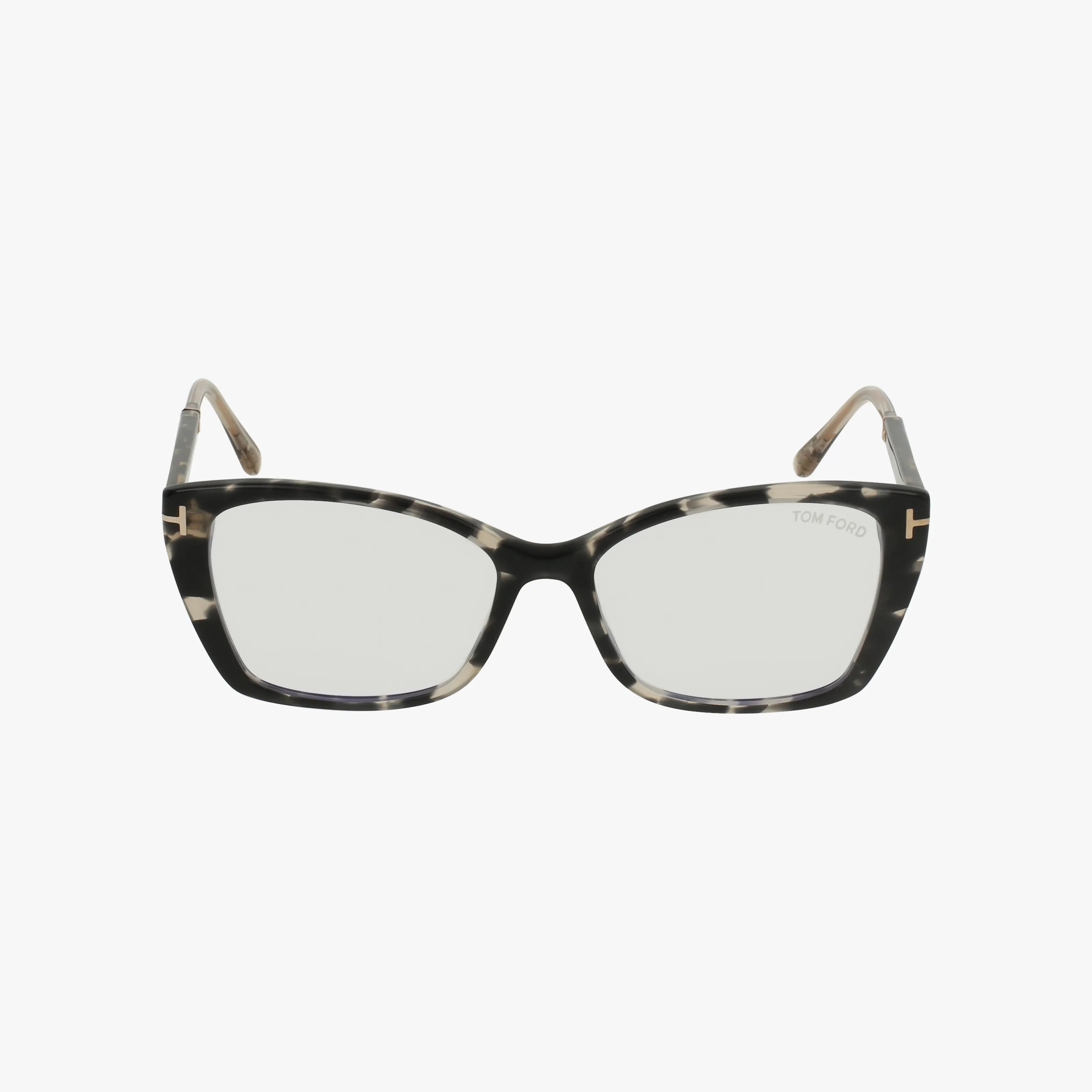 Front view of FT5893-B cat-eye eyeglasses featuring a black and white tortoiseshell lightweight frame, clear lenses, gold T accents on the hinges, and subtle Tom Ford branding on the right lens—ideal for daily wear.