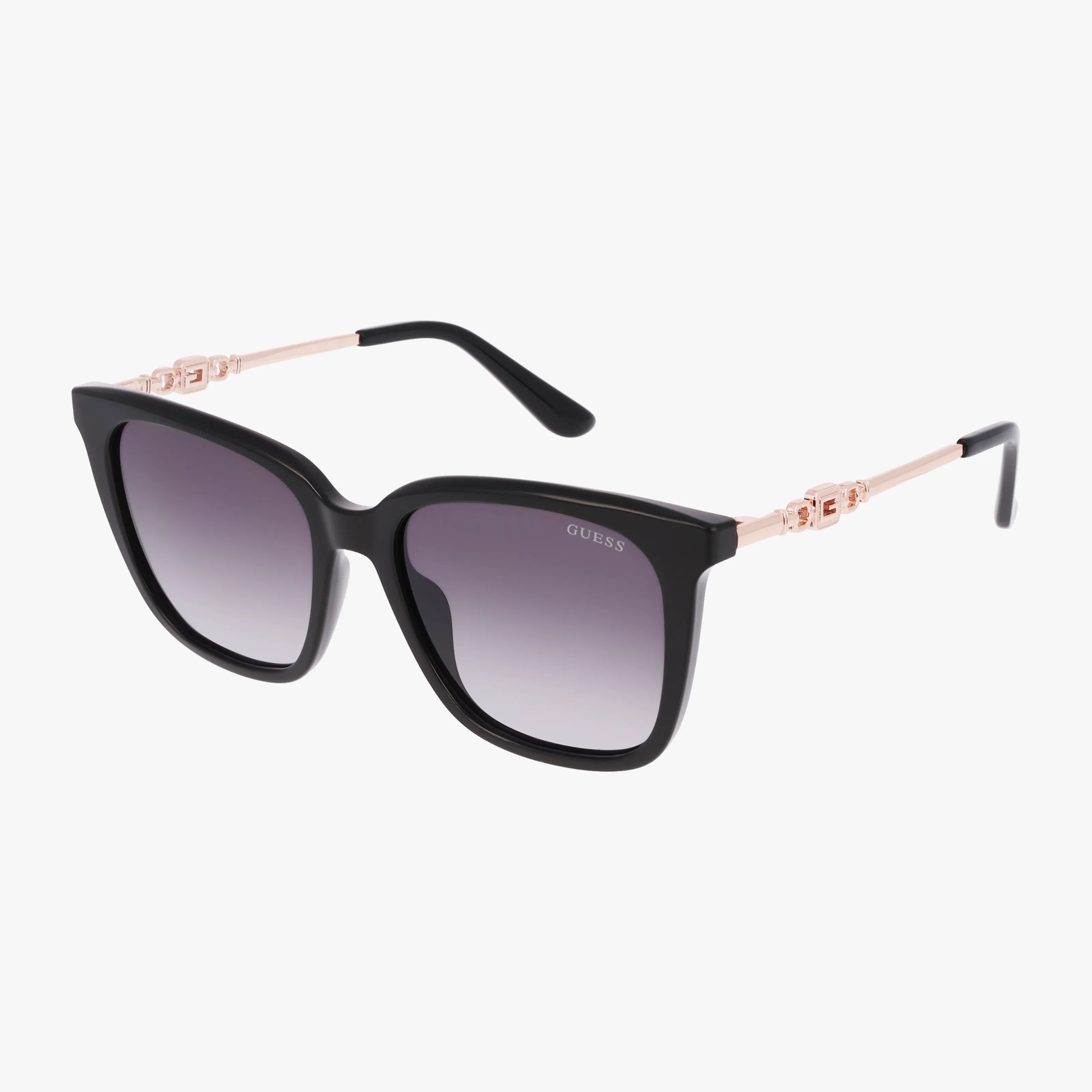 The GU7886 features black square frames, gradient dark lenses, gold-tone metal arms, and subtle hinge details. Stylishly displayed on a white background, these sunglasses are perfect for updating your eyewear collection online.