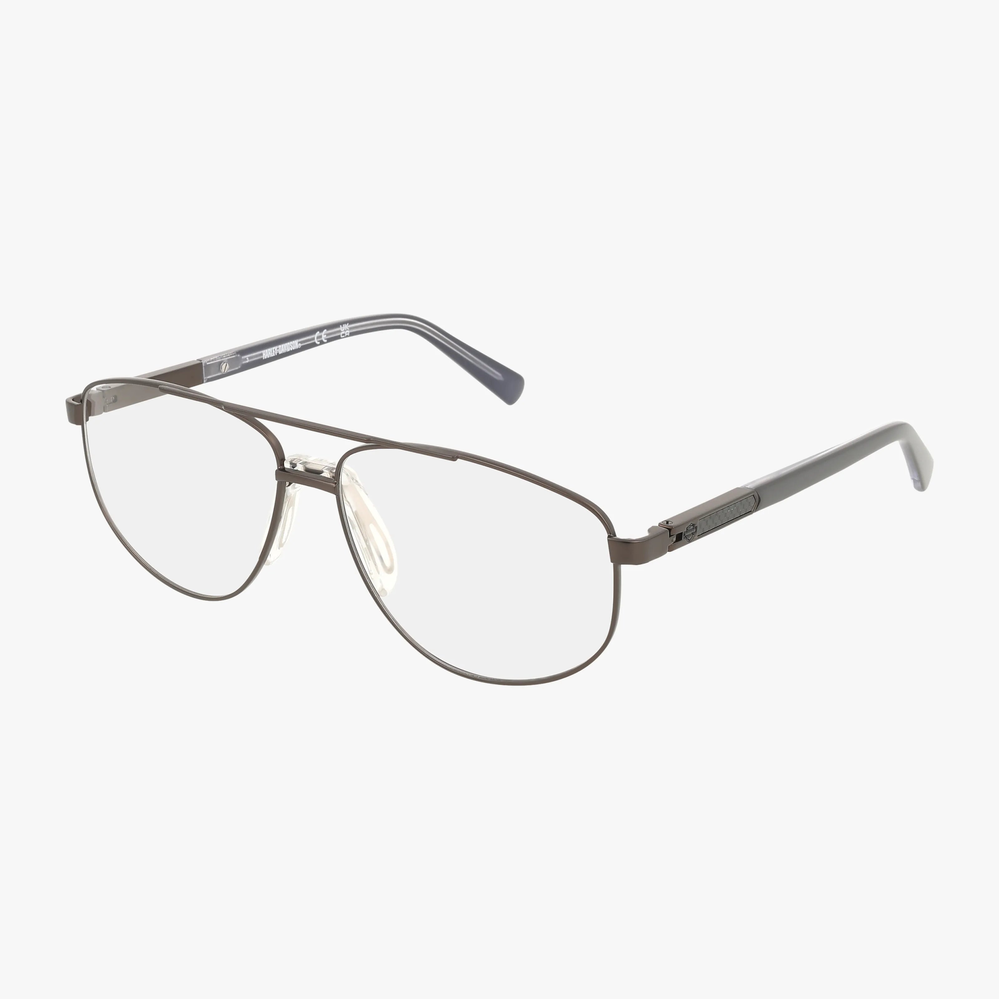 The HD0977 metal aviator eyeglasses feature clear lenses, thin gray frames, and straight temples, capturing Harley Davidson confidence—displayed on a white background.