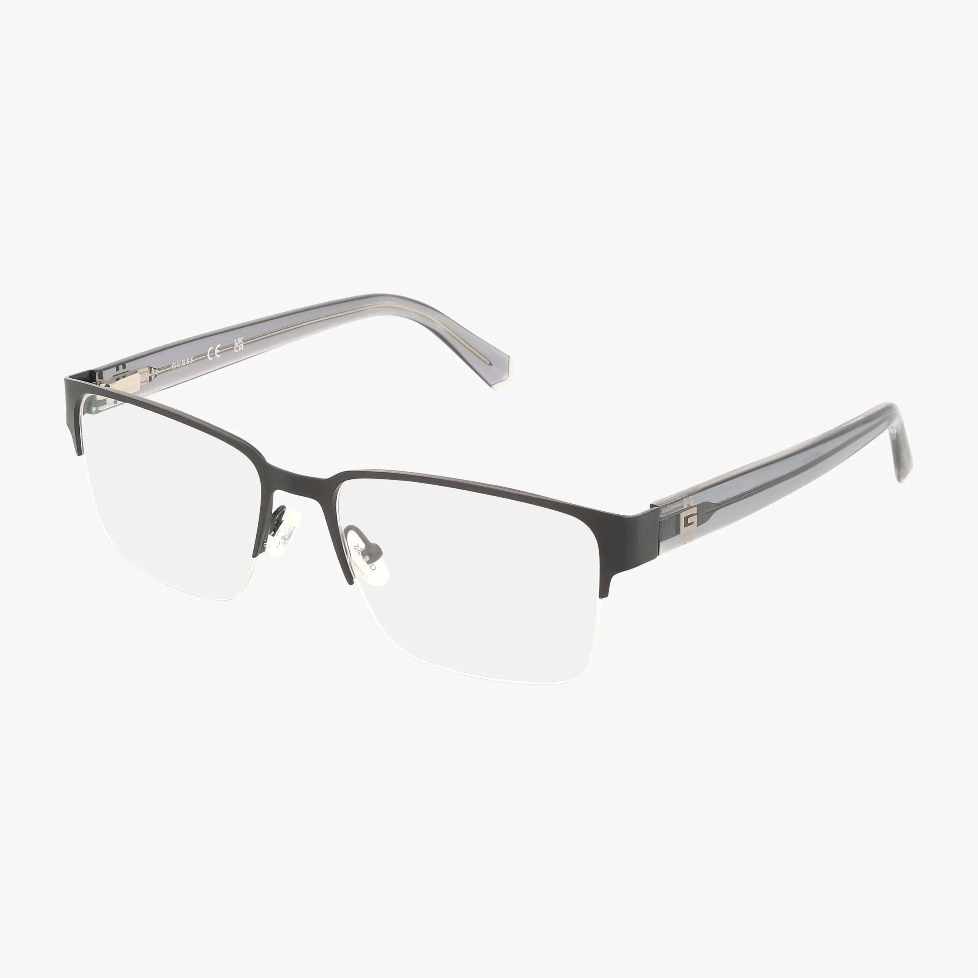 The GU50095 eyeglasses feature a rectangular, semi-rimless design with a lightweight black metal frame and clear plastic temples, ideal for daily wear and displayed on a white background.