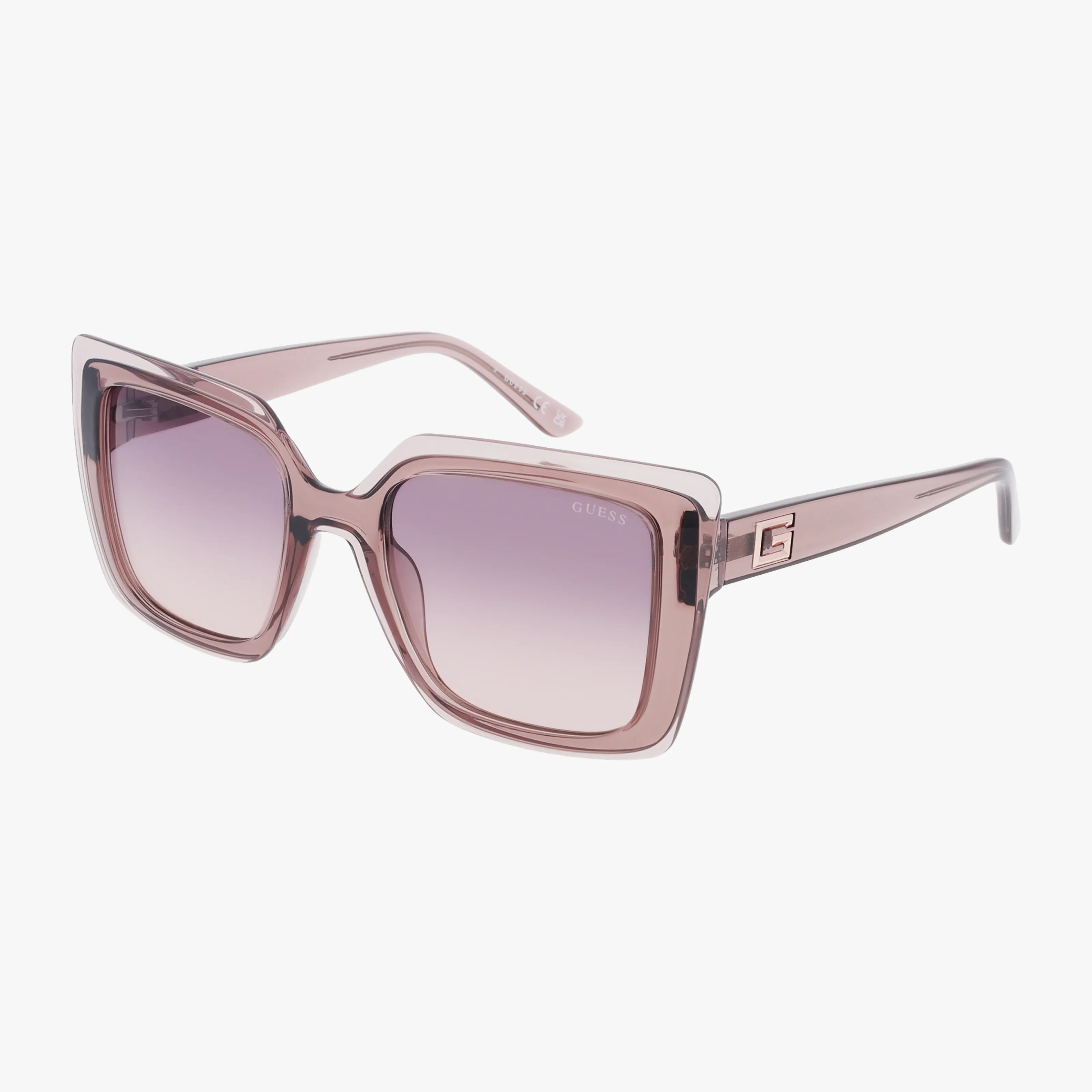 The GU7908 features square-shaped, translucent pink bold frames with gradient lenses, a durable build, and metallic G logos on the temples.