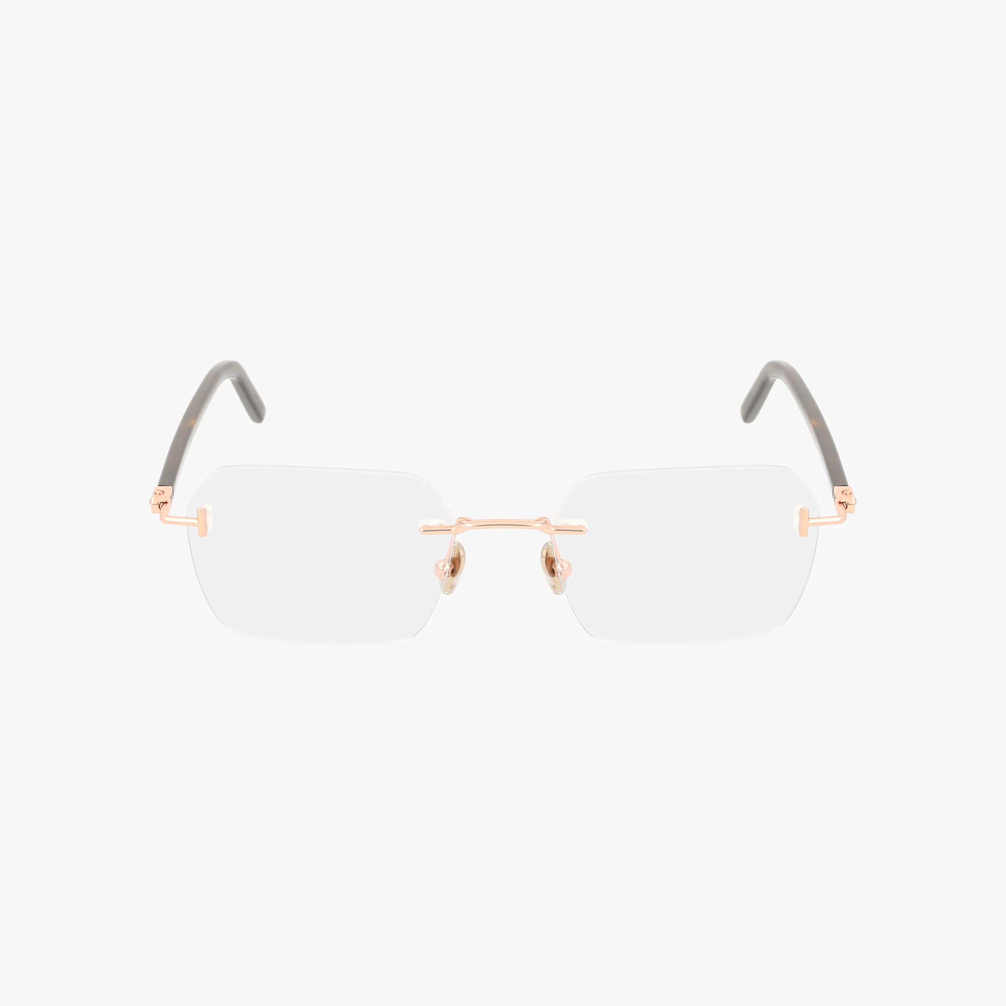 The FT5934-B features rimless rectangular lenses, a gold-tone nose bridge and temples, and black earpieces crafted from modern materials—premium eyewear displayed on a white background.