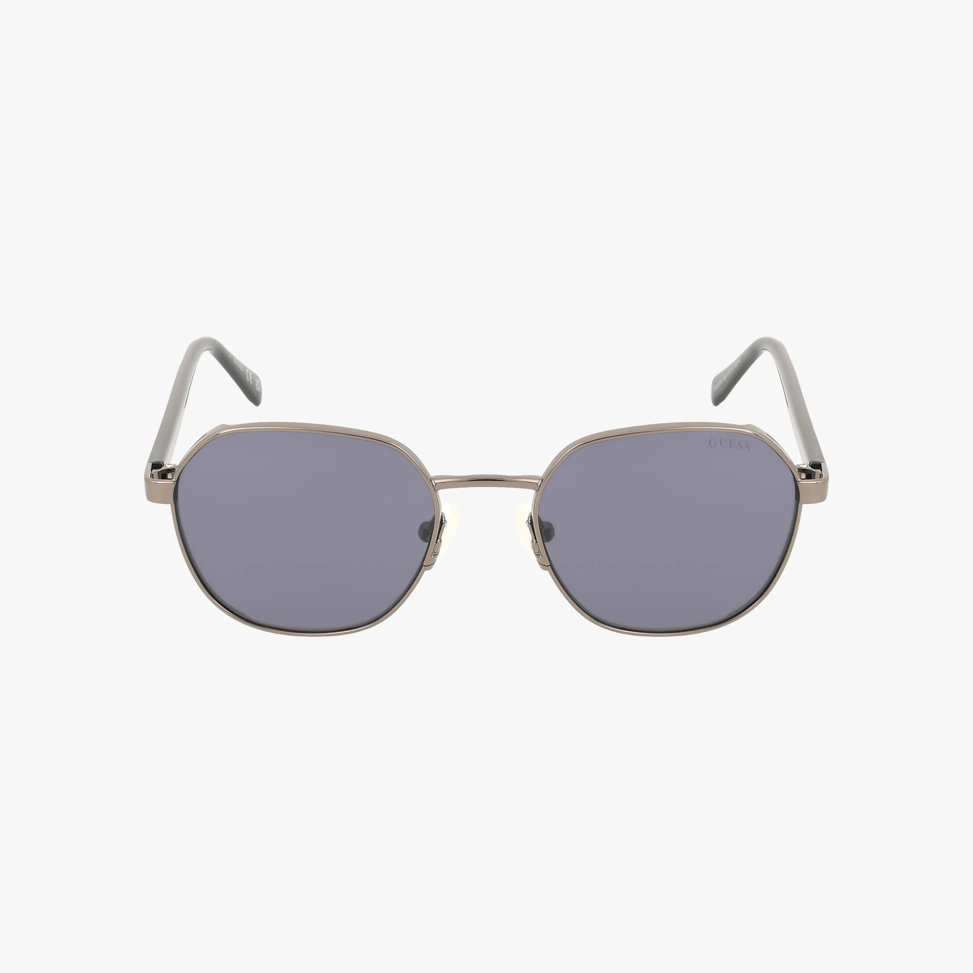 Front view of GU00116 sunglasses from our eyewear collection, with thin metallic frames and dark rounded rectangular lenses. The straight, dark temples are highlighted against a white background—ideal for online shopping.