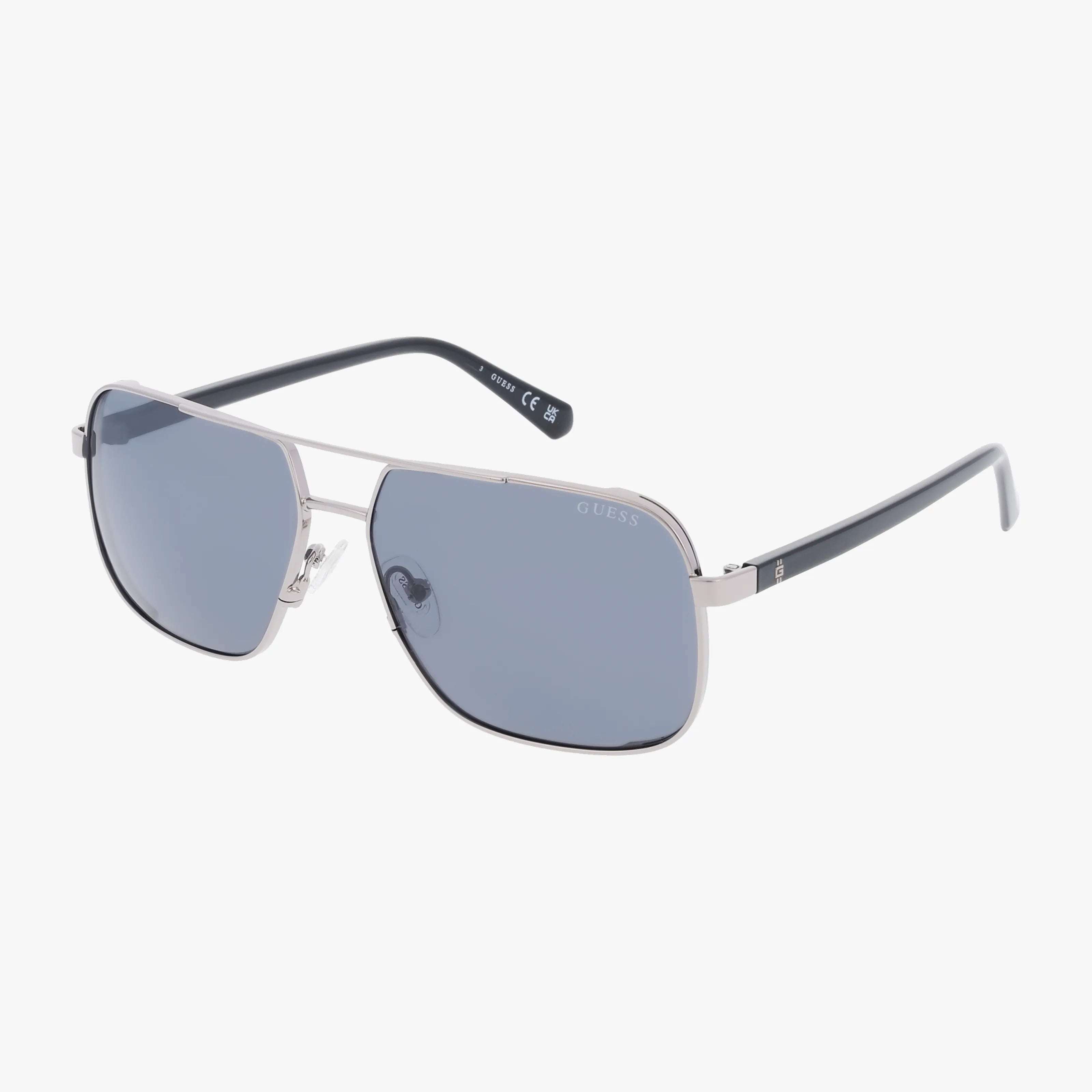 The GU00119/S classic sunglasses feature a lightweight silver aviator frame, blue-tinted lenses, and thin black arms for practical protection, all displayed on a crisp white background.