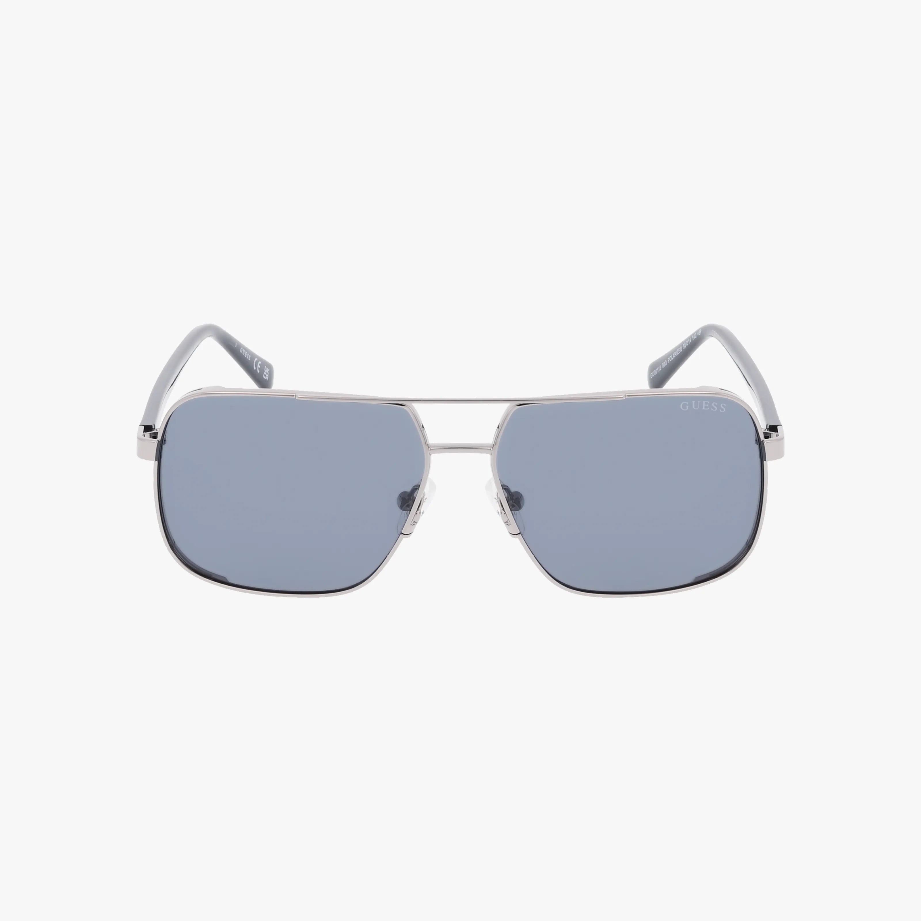 Front view of GU00119/S classic sunglasses with a lightweight frame, blue-tinted rectangular lenses, and clear nose pads for sun protection, displayed against a plain white background.