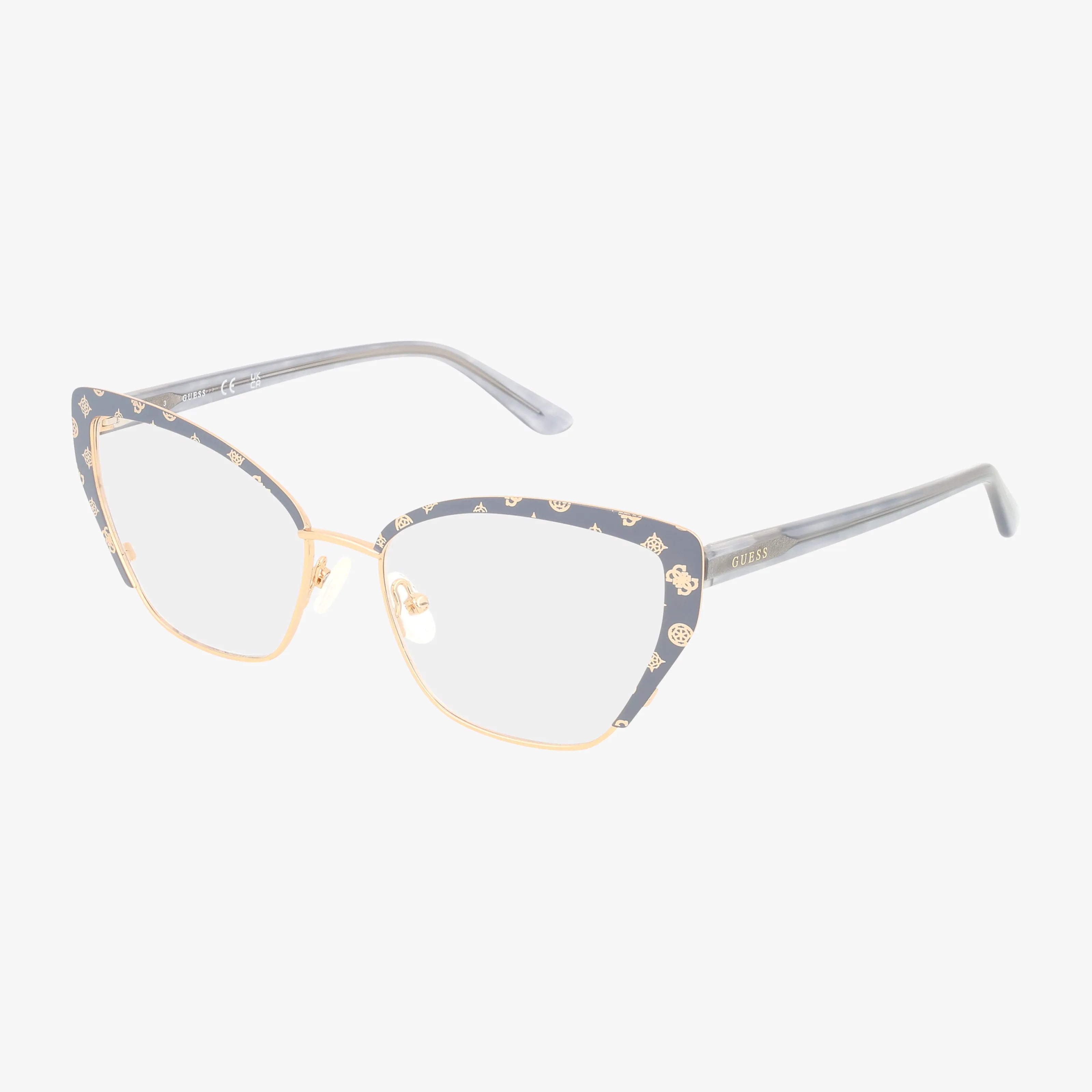 The GU50122/V cat-eye eyeglasses feature gold metal frames, gray patterned upper rims, clear lenses, and slim gray temples—a modern style compatible with vision insurance.