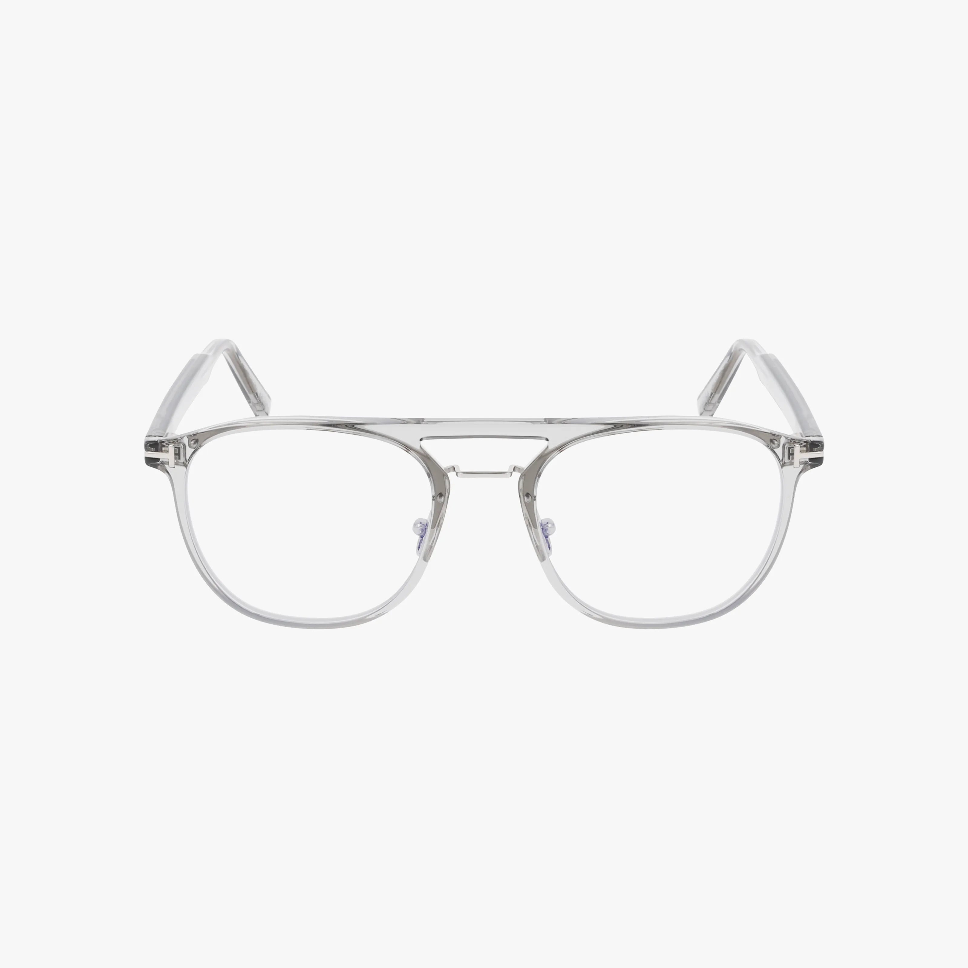 The FT5982-B features clear, transparent lenses in a classic aviator-style frame with a visible metal bridge and thin arms. Designed for daily wear and compatible with vision insurance, it's shown on a plain white background.