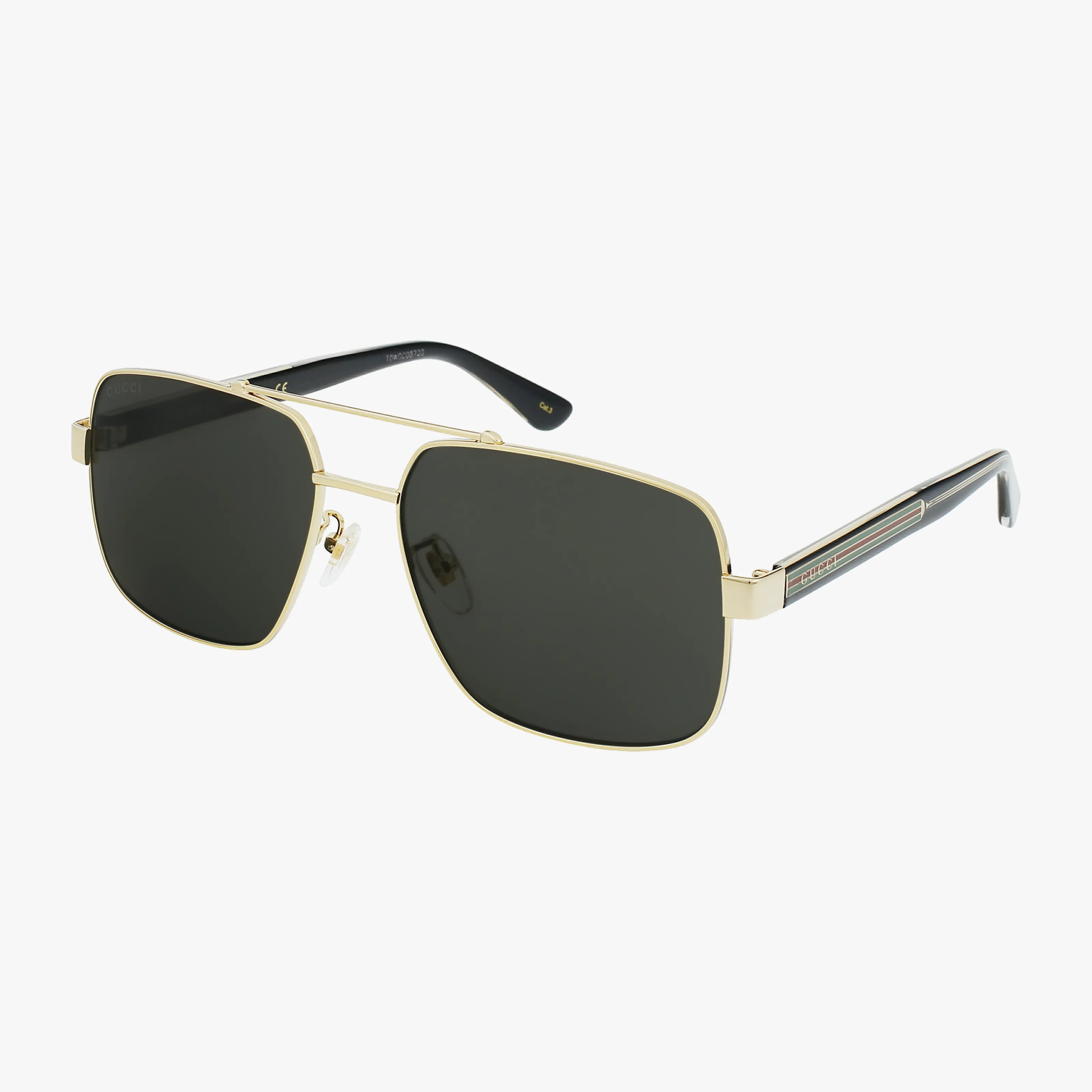 The GG0529S is a pair of vintage metal sunglasses featuring gold aviator-style frames, black temple arms, and dark tinted rectangular lenses, shown against a white background.