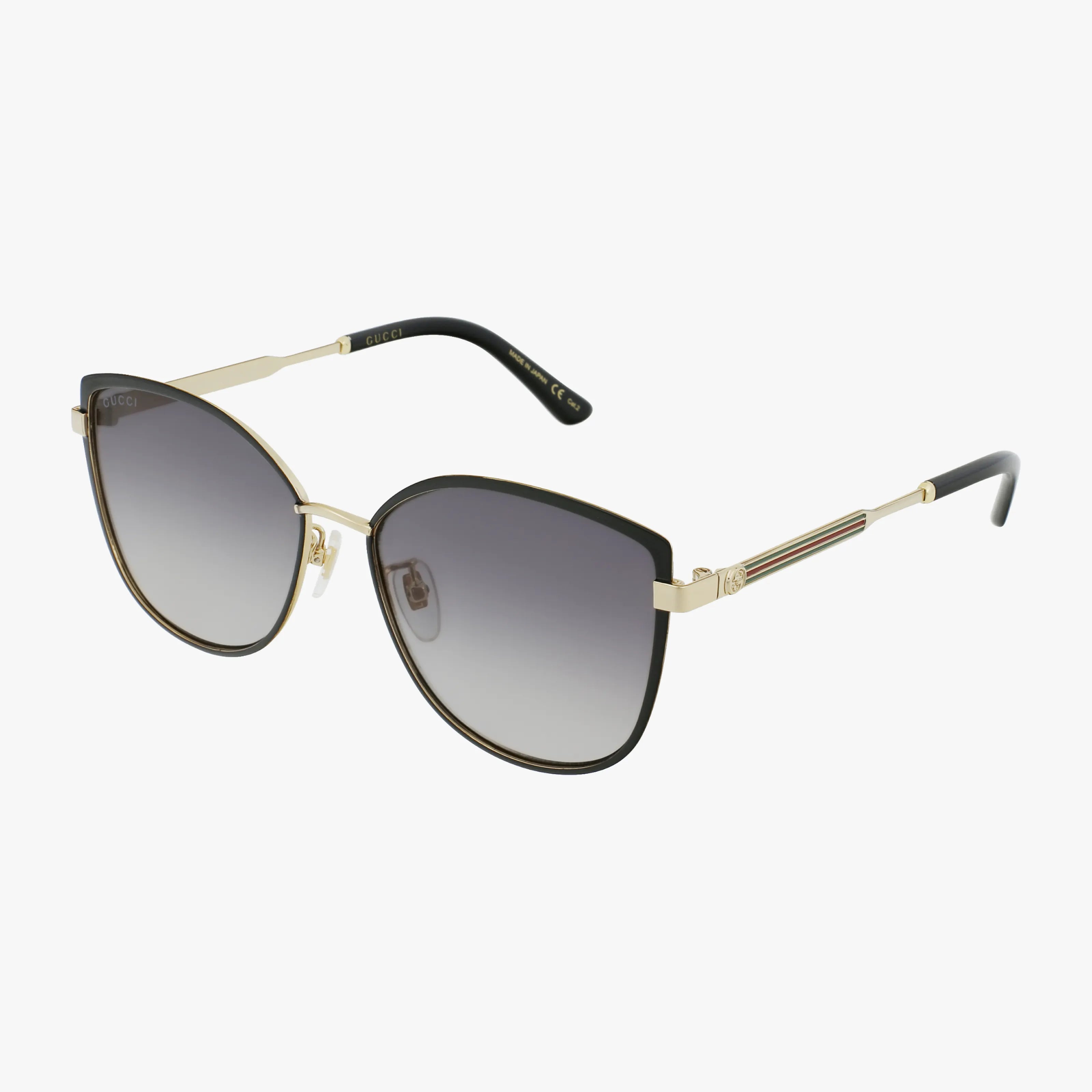 Gold-framed Gucci GG0589SK cat-eye sunglasses with gradient gray lenses and black temple tips, featuring subtle logo accents on the arms—stylish eyewear ideal for elevating any ensemble.